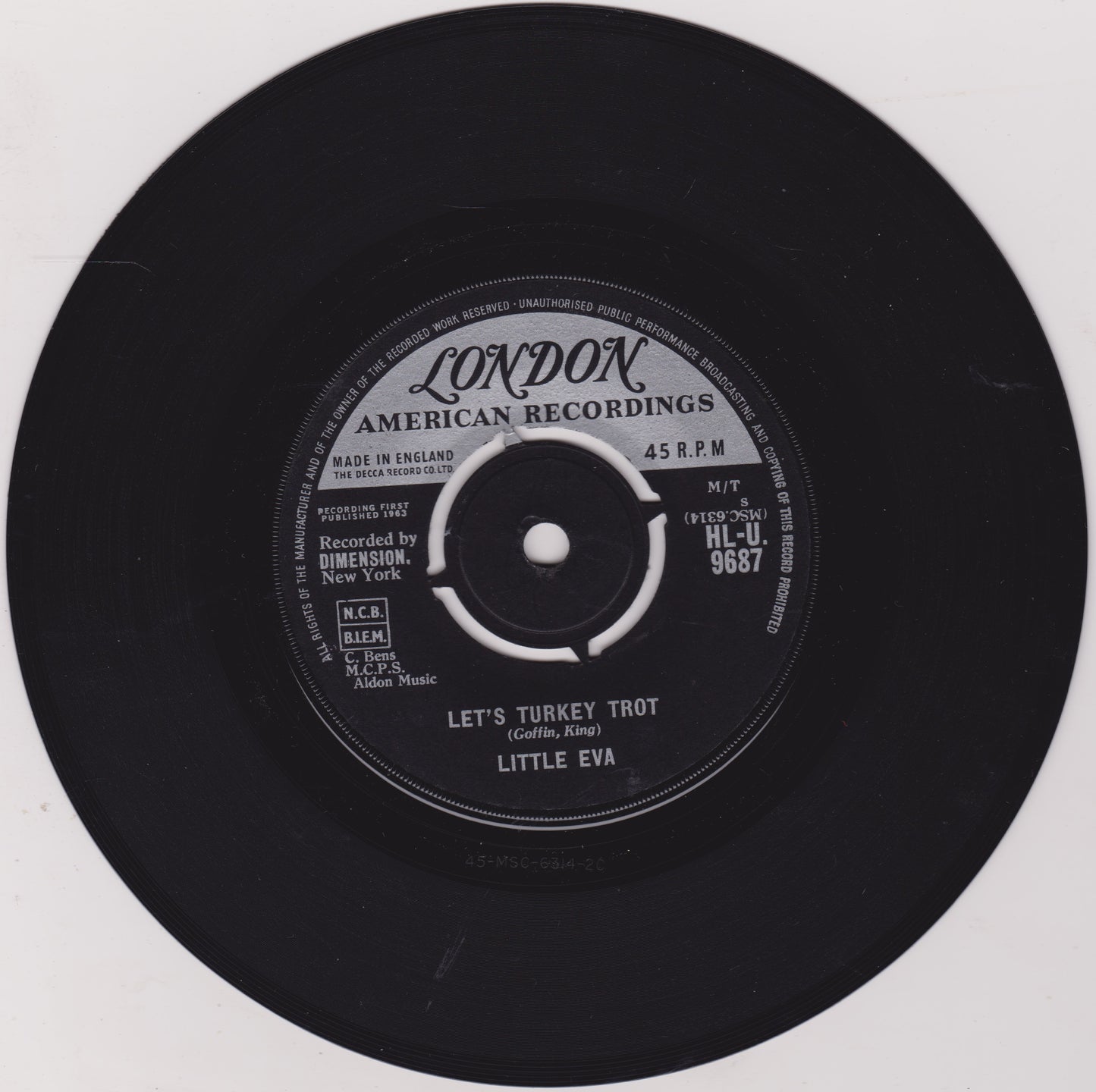 Black vinyl record with 'London American Recordings' label on a white background