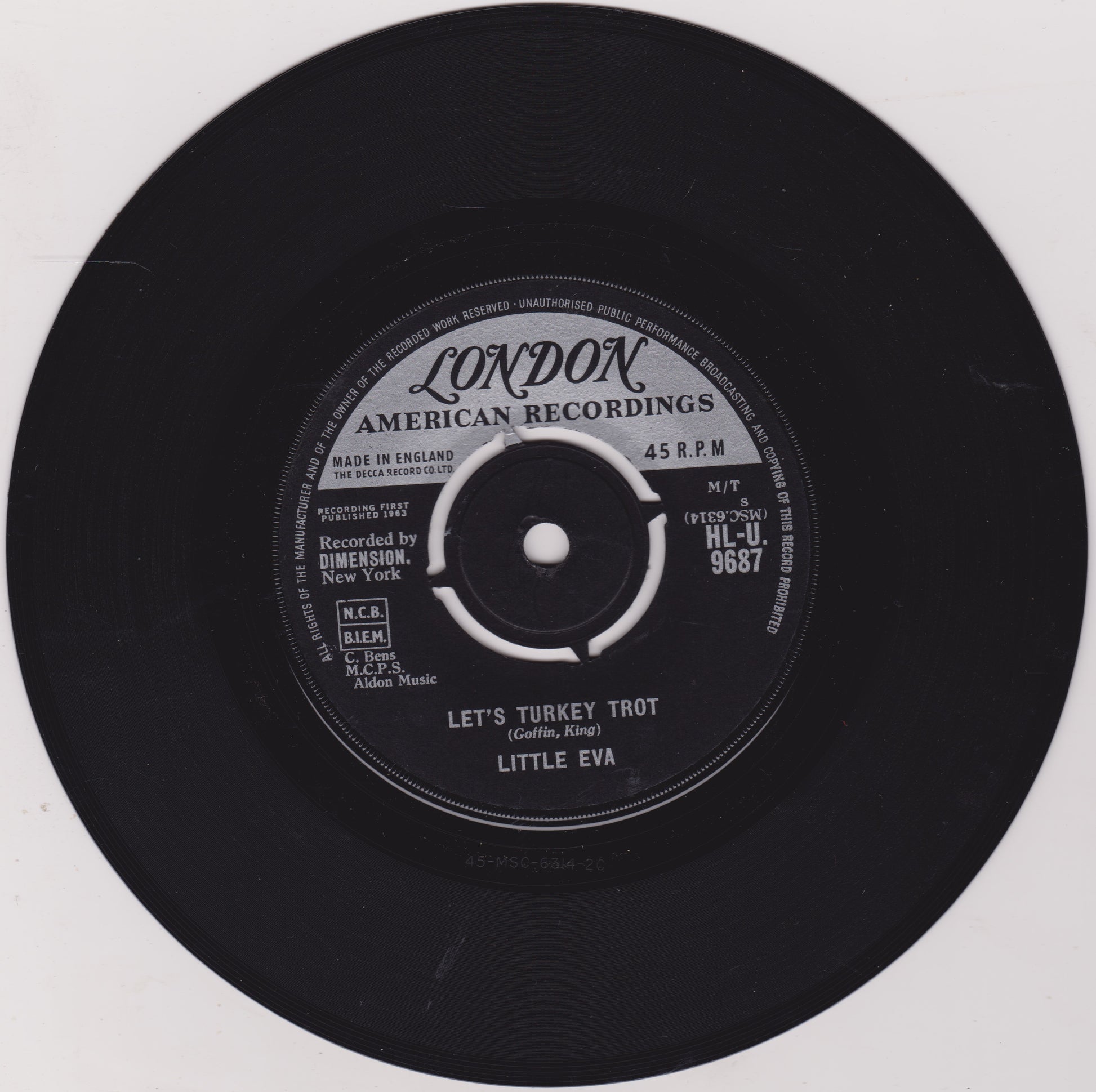 Black vinyl record with 'London American Recordings' label on a white background