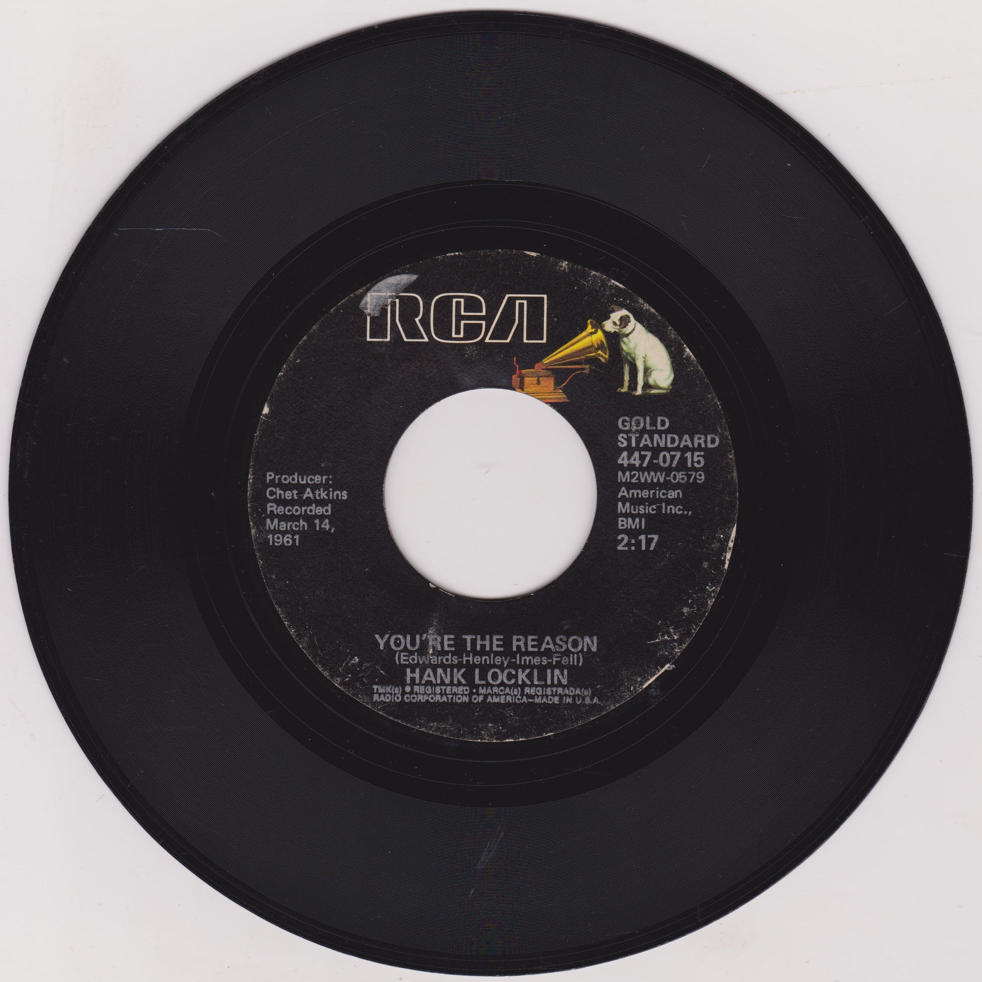 Black vinyl record with RCA label and white label text on a white background
