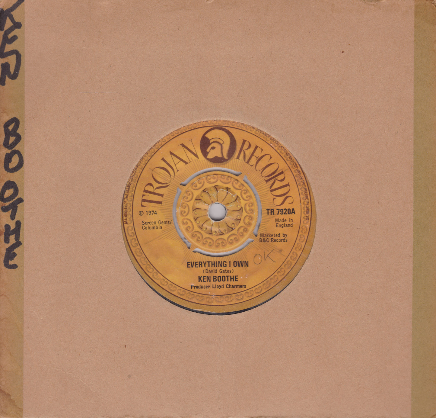 Trojan Records vinyl record label on a brown background