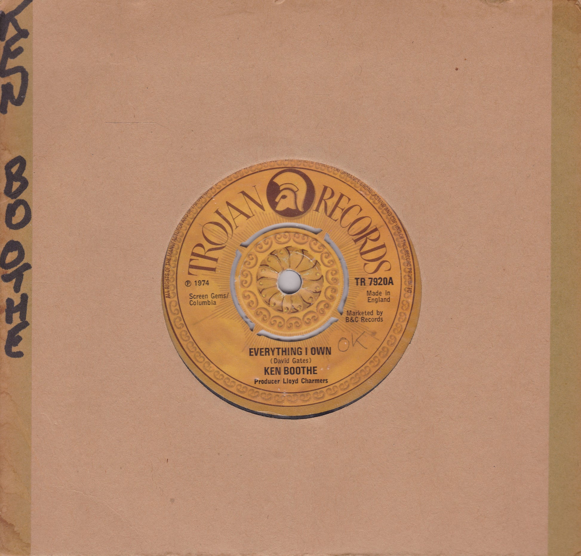 Trojan Records vinyl record label on a brown background