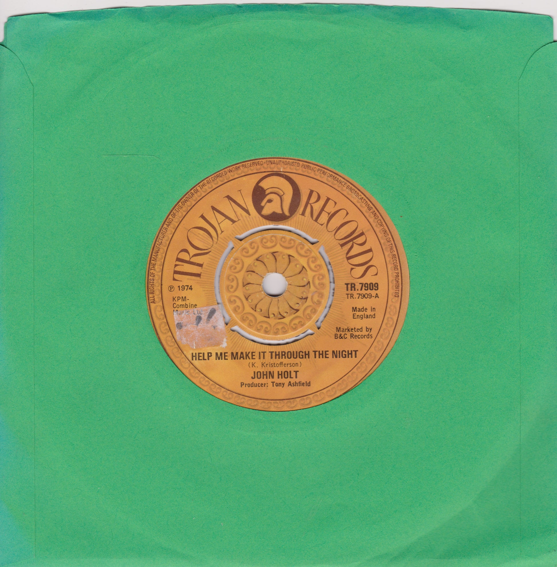 Vinyl record with Trojan Records label on a green background