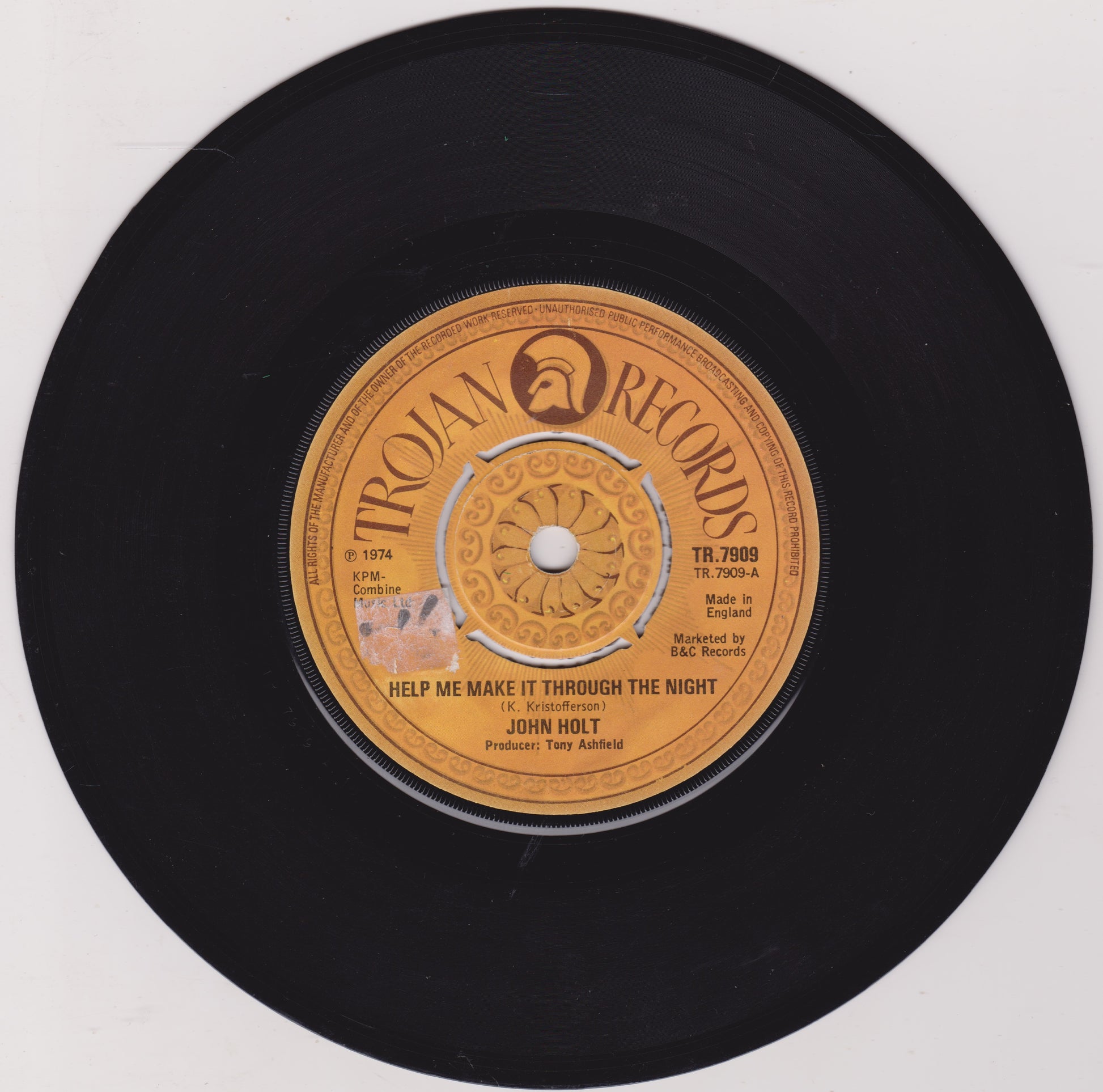 Vinyl record with Trojan Records label on a white background