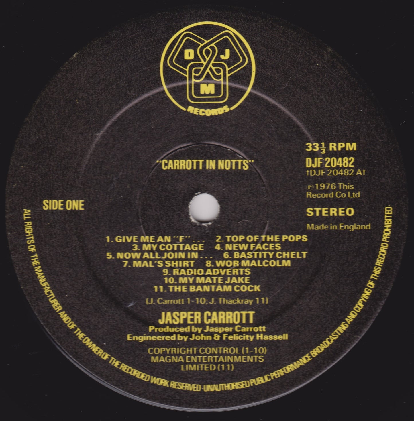 Record label with yellow text on a black background