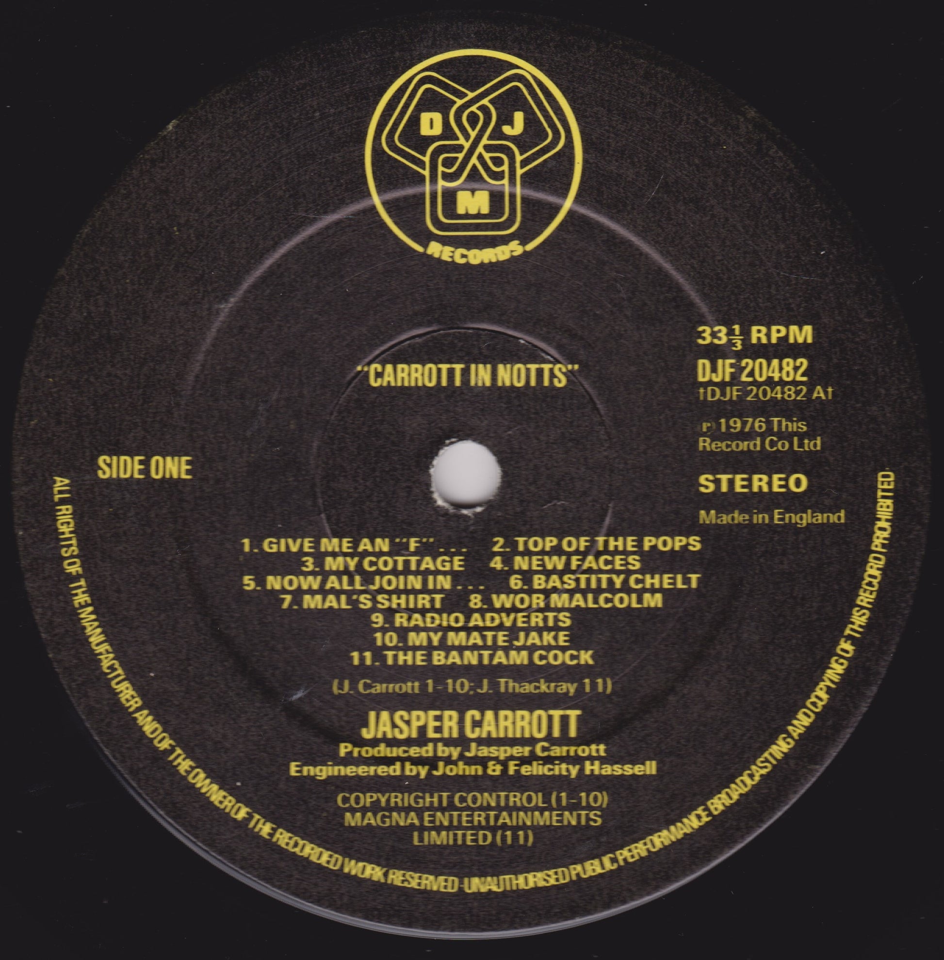 Record label with yellow text on a black background