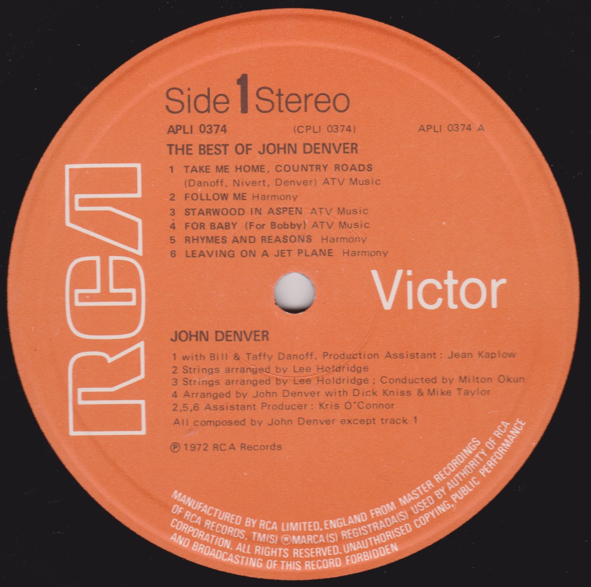 Record label for 'The Best of John Denver' by RCA Victor on an orange background