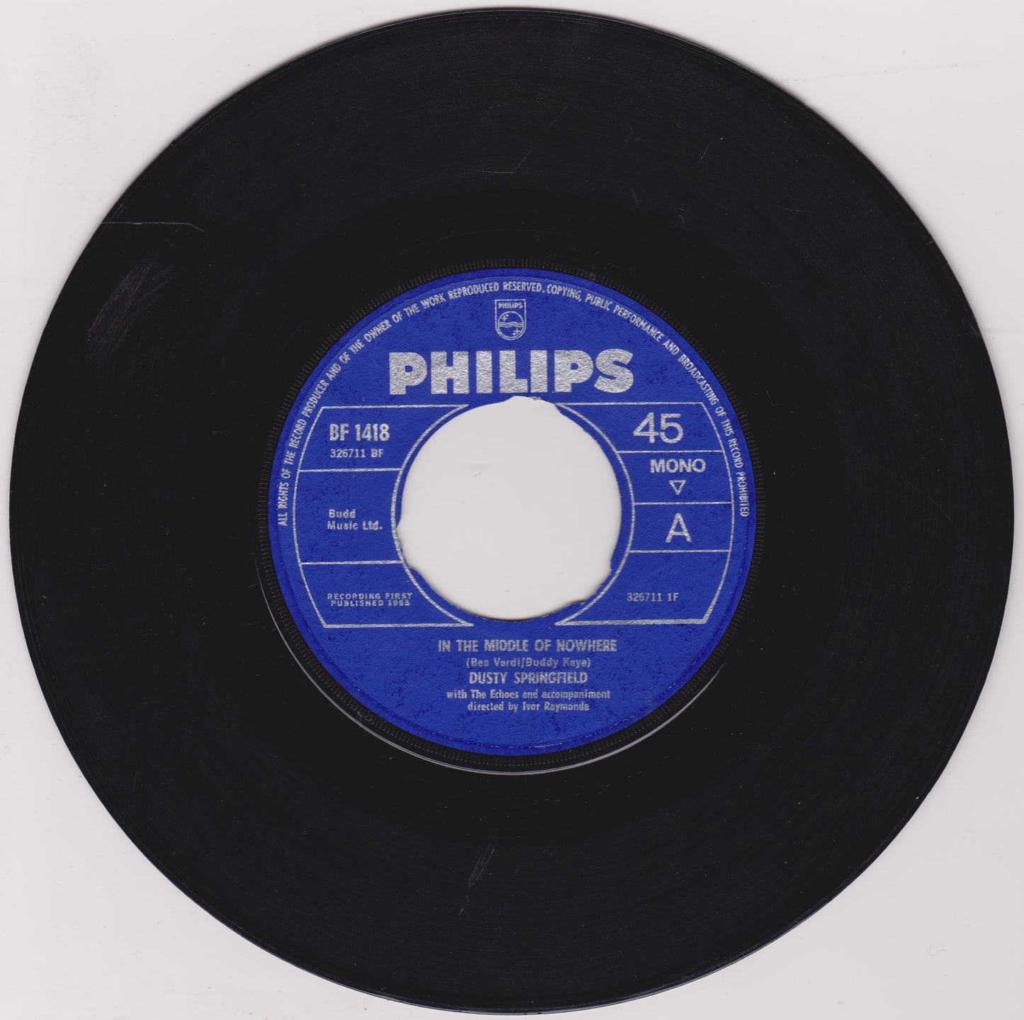 Black vinyl record with a blue Philips label on a white background
