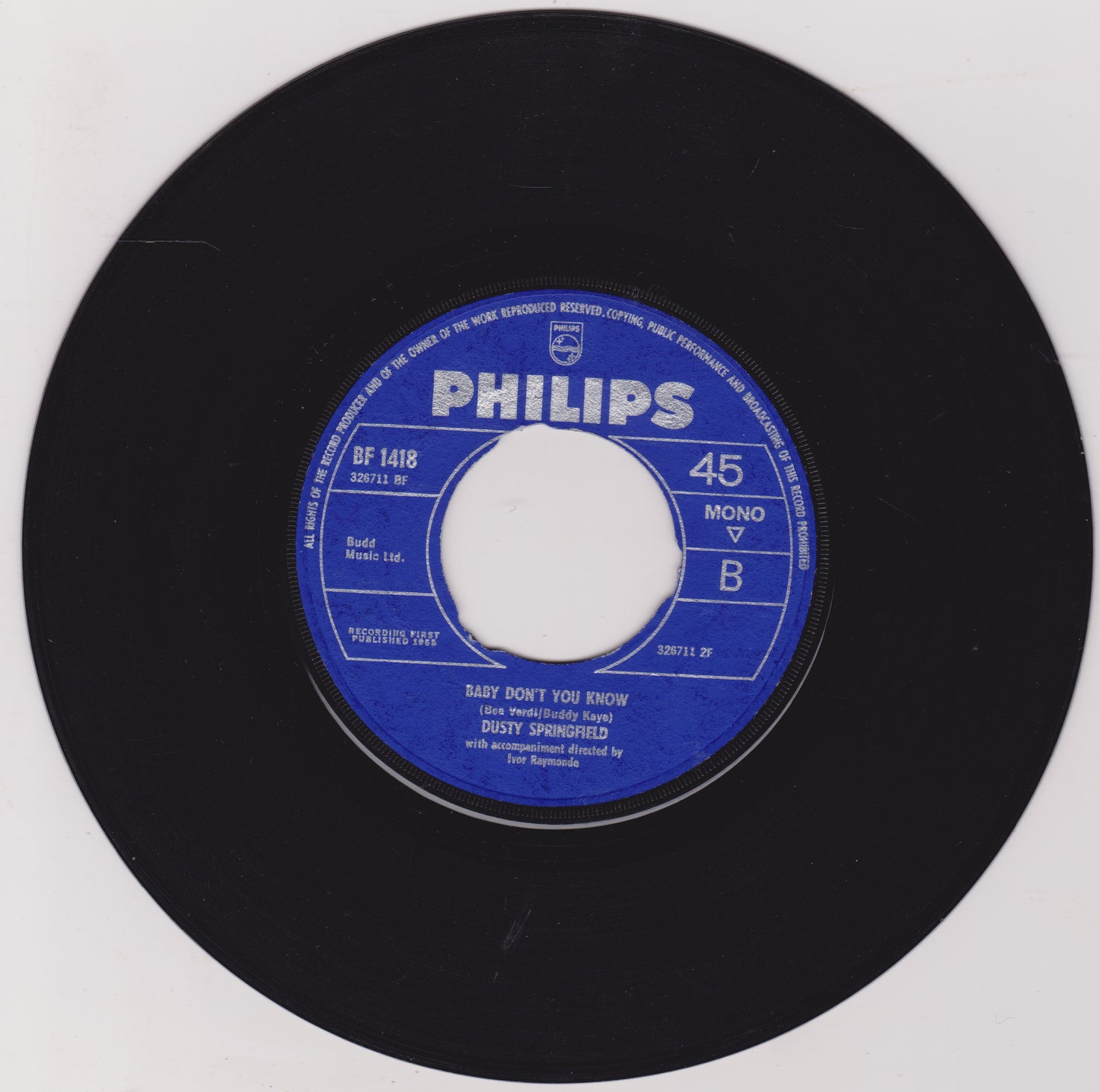 Black vinyl record with a blue Philips label on a white background