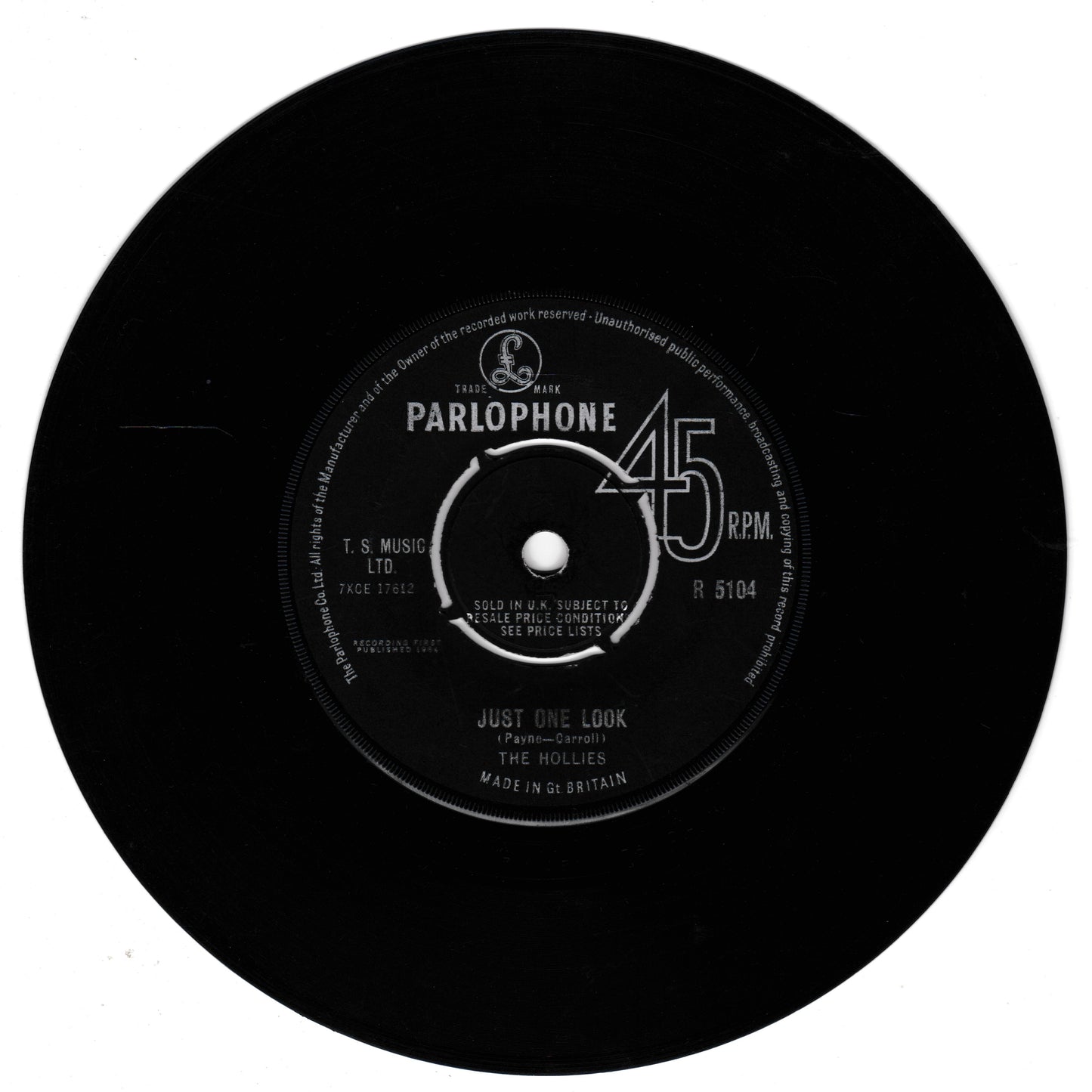 A black 45 RPM vinyl record center label for Parlophone, featuring the song 'Just One Look' by The Hollies, with white printed text and logo details on a plain white background.