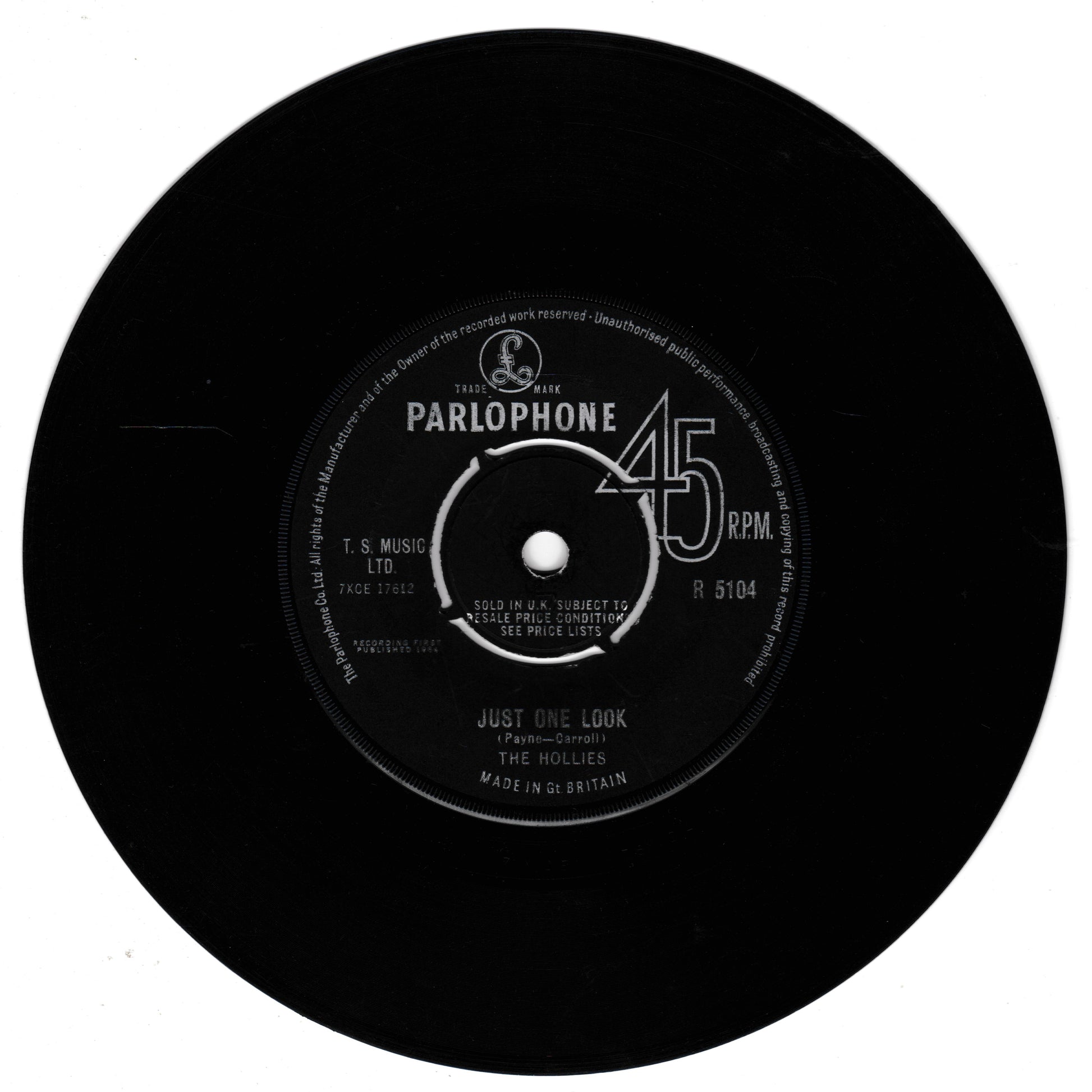 A black 45 RPM vinyl record center label for Parlophone, featuring the song 'Just One Look' by The Hollies, with white printed text and logo details on a plain white background.