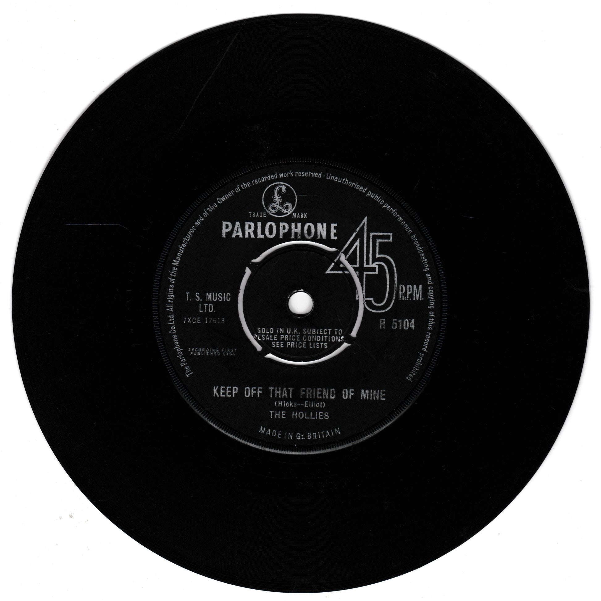 A black vinyl record label from Parlophone, featuring the song 'Keep Off That Friend of Mine' by The Hollies, with white printed text and a 45 RPM marking.