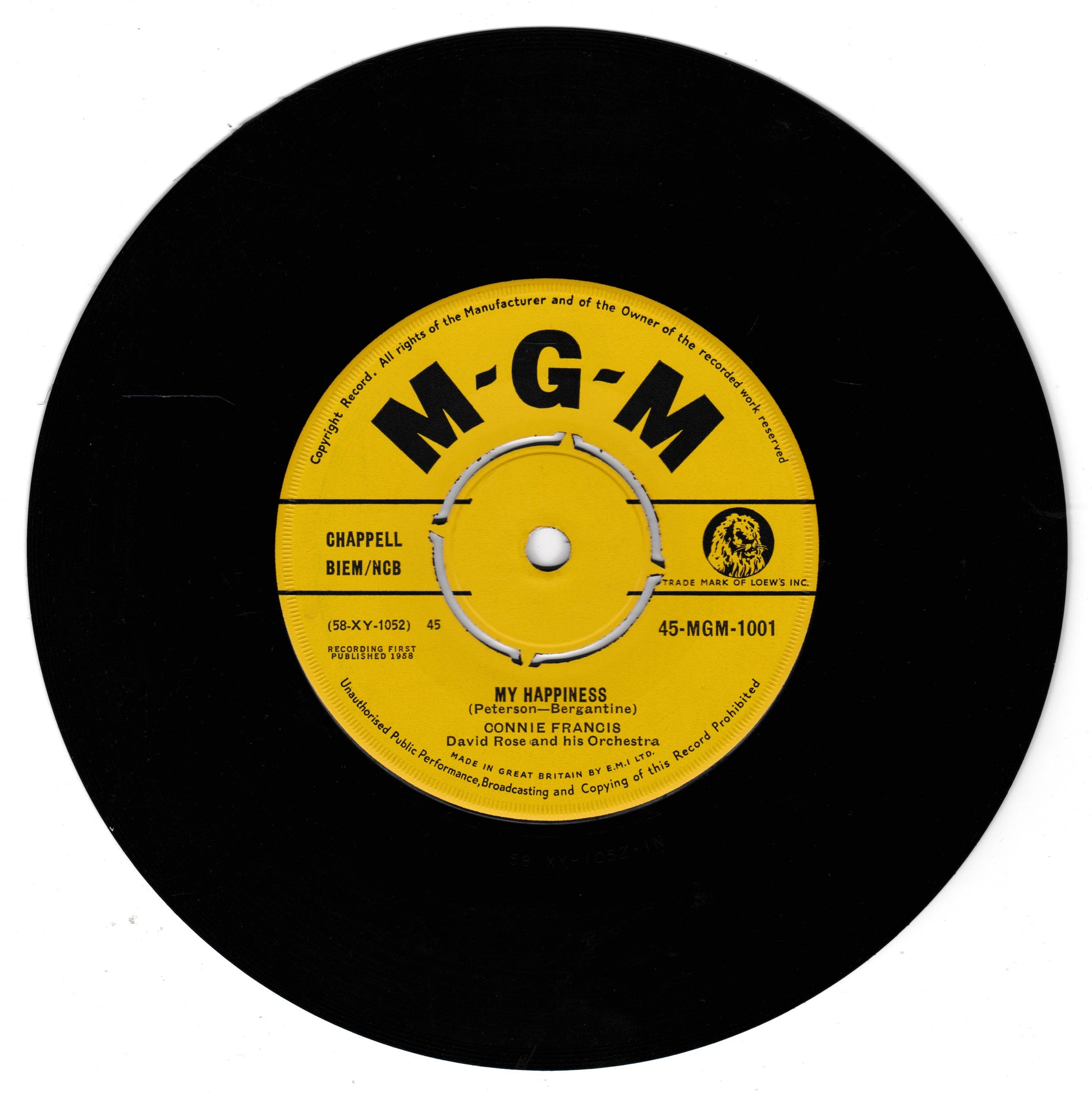 A black vinyl record with a yellow centre label featuring the M-G-M logo and song details for Connie Francis's 'My Happiness'.