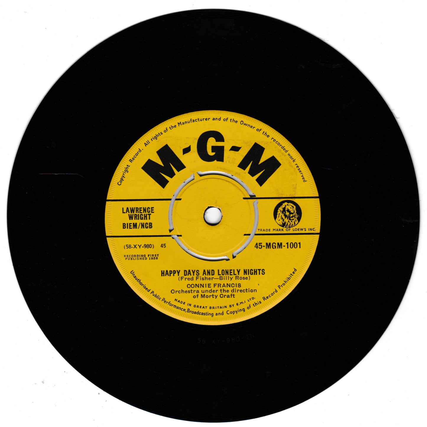 A black vinyl record with a yellow M-G-M label, featuring Connie Francis's 'Happy Days and Lonely Nights'.