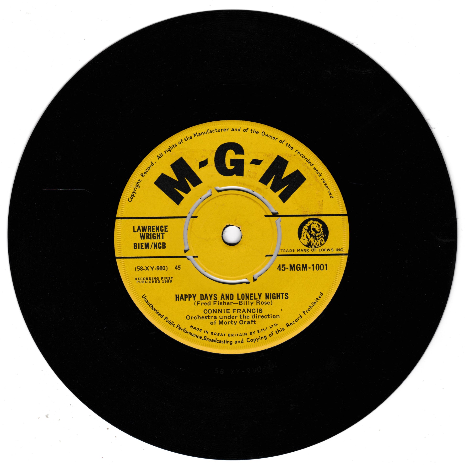 A black vinyl record with a yellow M-G-M label, featuring Connie Francis's 'Happy Days and Lonely Nights'.