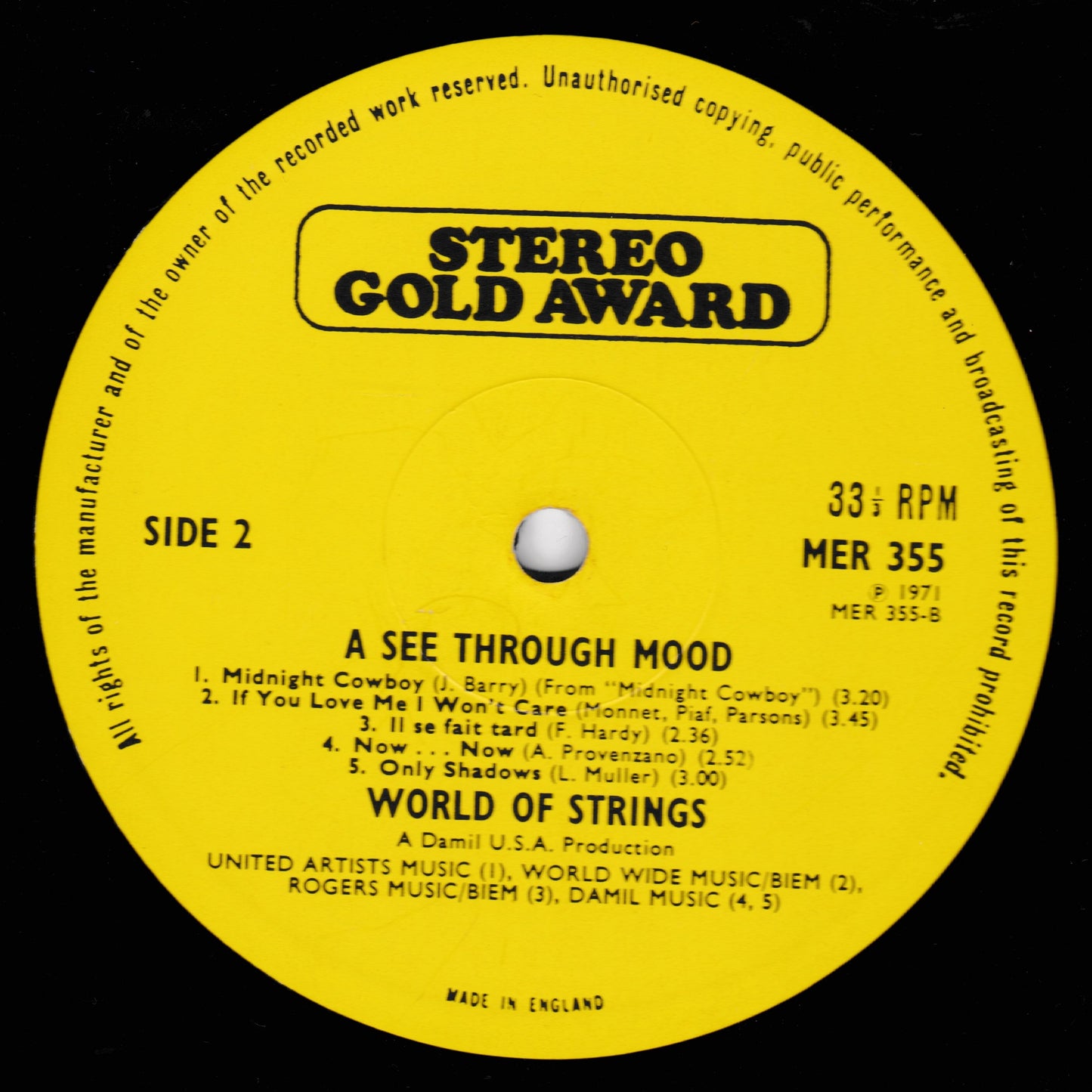 Record label from a vinyl record with 'Stereo Gold Award' branding and track listing.