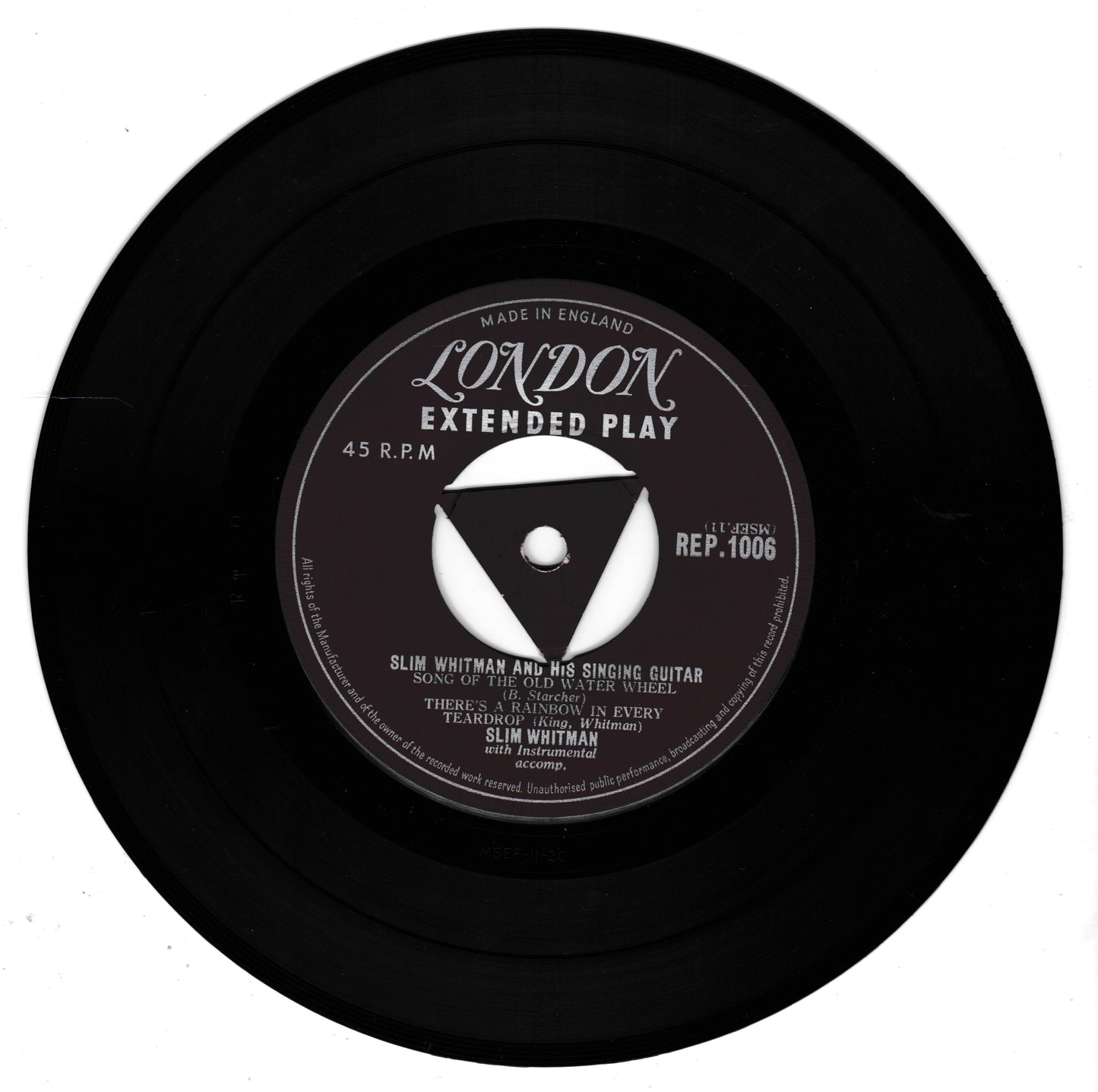 A black 45 RPM vinyl record with a central label for London Extended Play, featuring Slim Whitman's 'There's No One To Judge'.