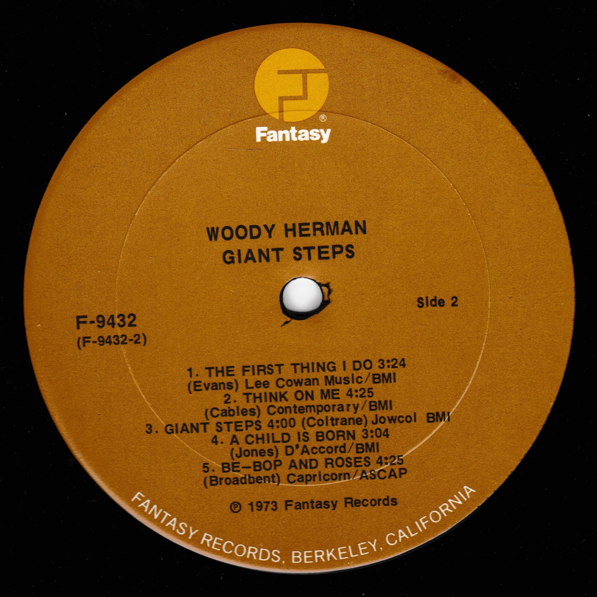Round brown label with text and 'Fantasy' logo for Woody Herman's 'Giant Steps' album.