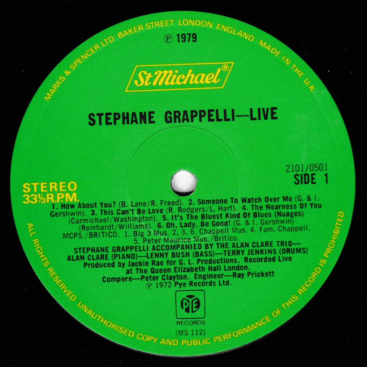 A green vinyl record label for 'Stephane Grappelli-Live' on St. Michael Records, featuring track listings and release details on a black background.
