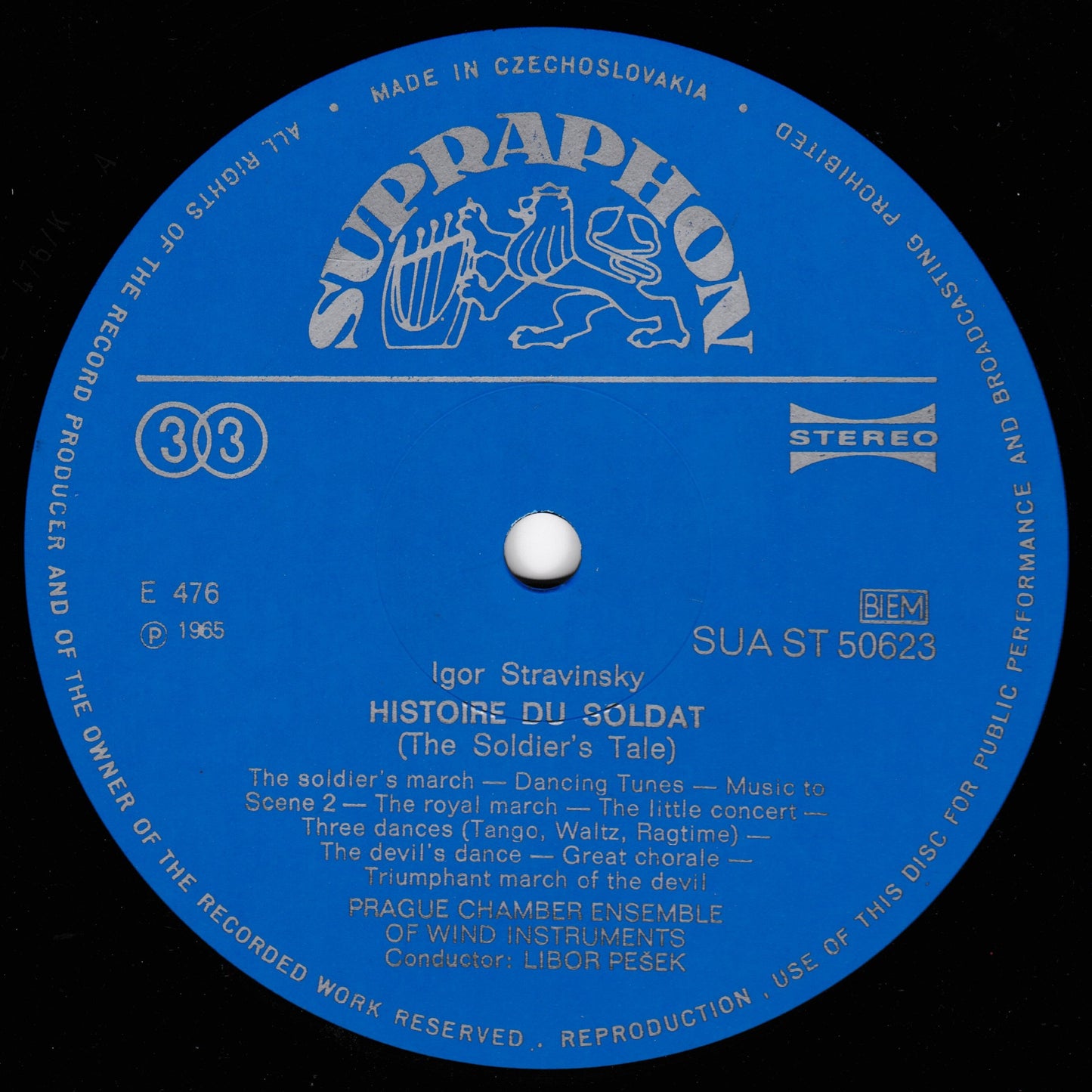 A blue vinyl record label for Supraphon Stereo, featuring Igor Stravinsky's 'Histoire du Soldat (The Soldier's Tale)'. The label includes white text and the Supraphon logo, with catalog number 303 and BFM 1965.