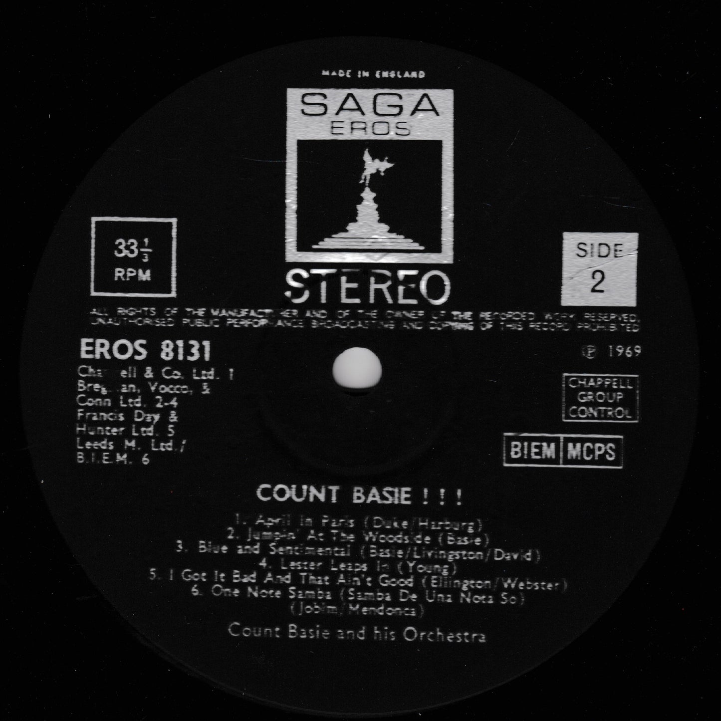 Record label with 'Saga Eros' branding and text on a black background