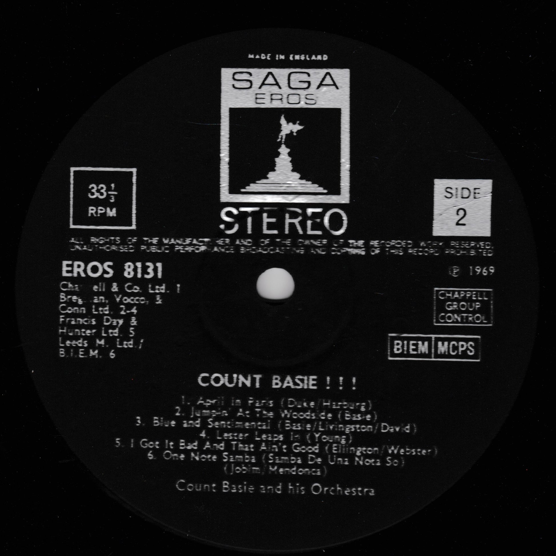 Record label with 'Saga Eros' branding and text on a black background
