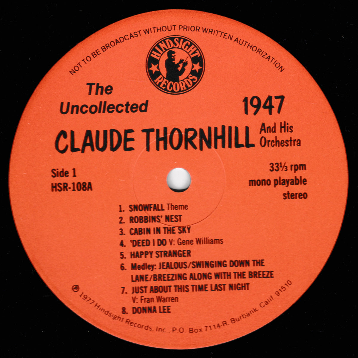 A close-up of a vinyl record label for Claude Thornhill's 'The Uncollected 1947' with an orange centre label on a black record, showing the Windsight Records logo and tracklist.