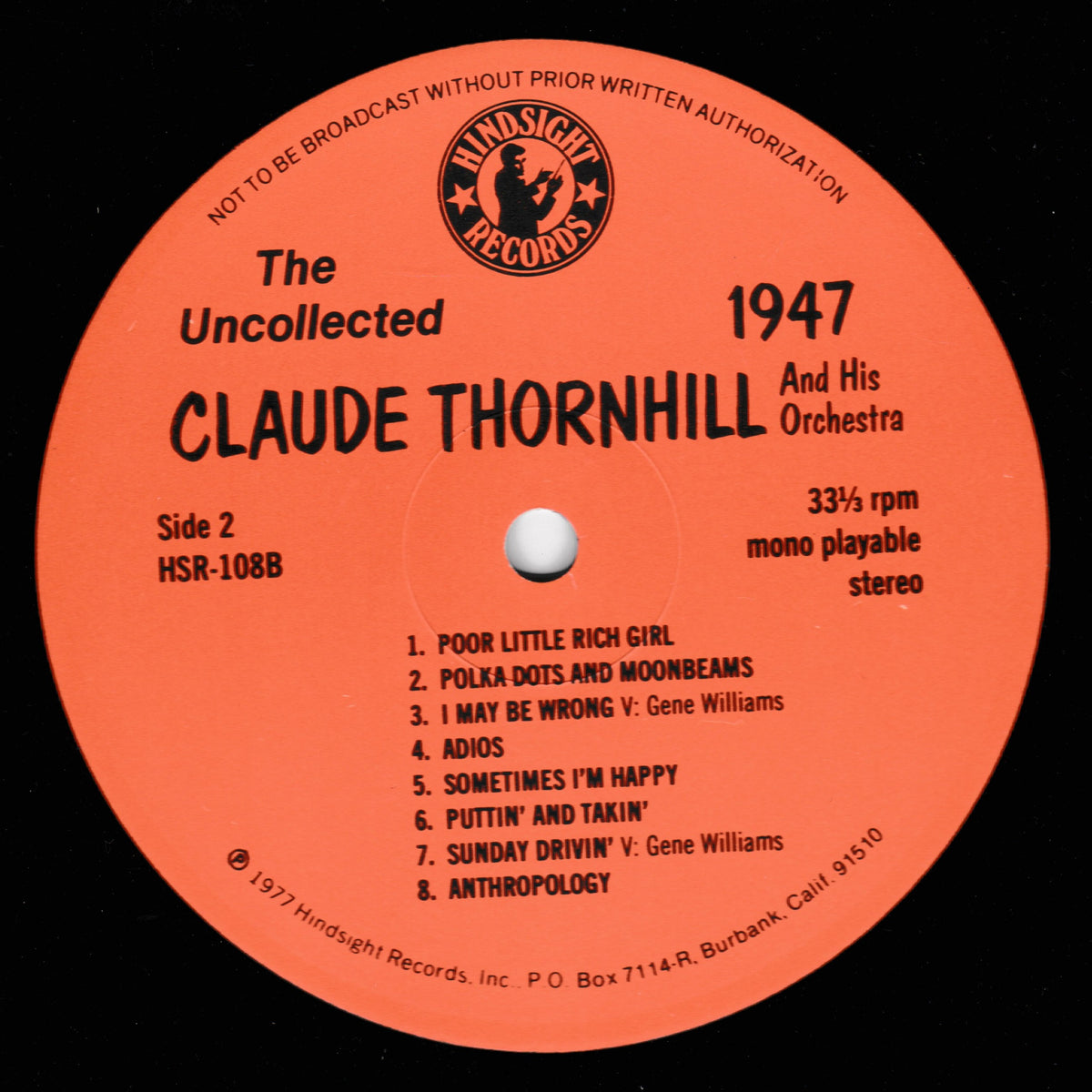 A close-up of a vinyl record label for Claude Thornhill's 'The Uncollected 1947' album, manufactured by Hindsight Records. The label is a vibrant orange with black text and the artist's name in a large serif font.