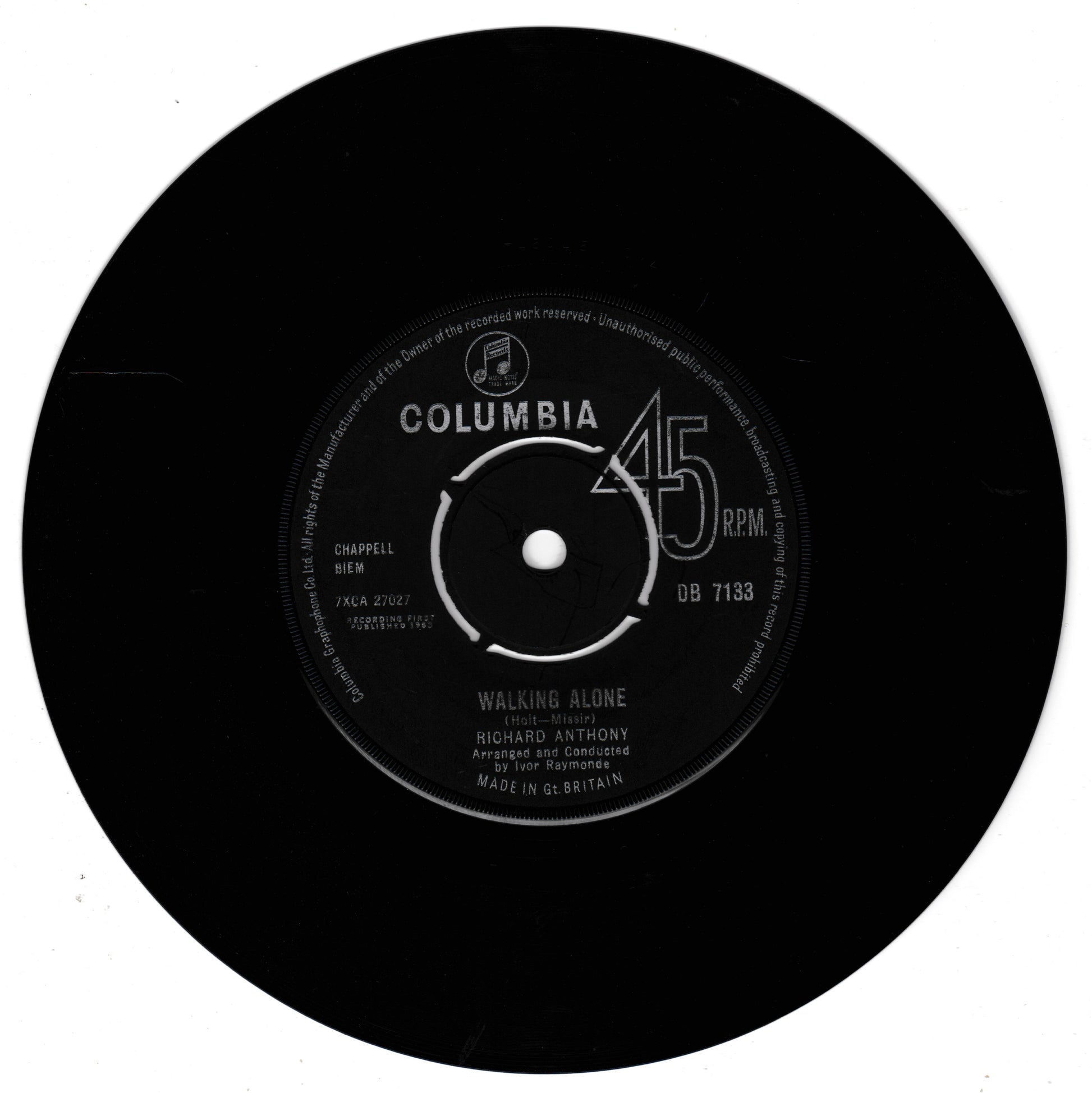 A black vinyl record with a white Columbia label, featuring the song title 'Walking Alone' by Richard Anthony.