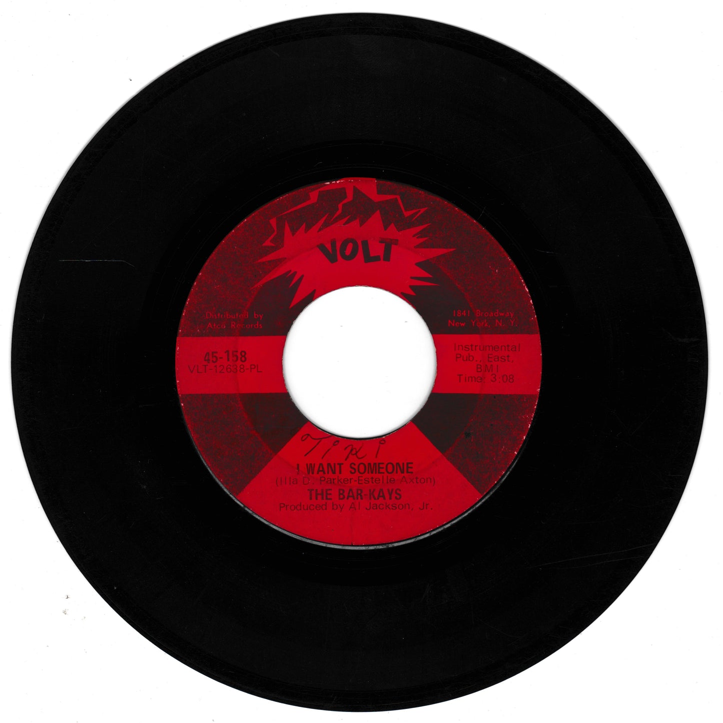Vinyl record with red label on a white background