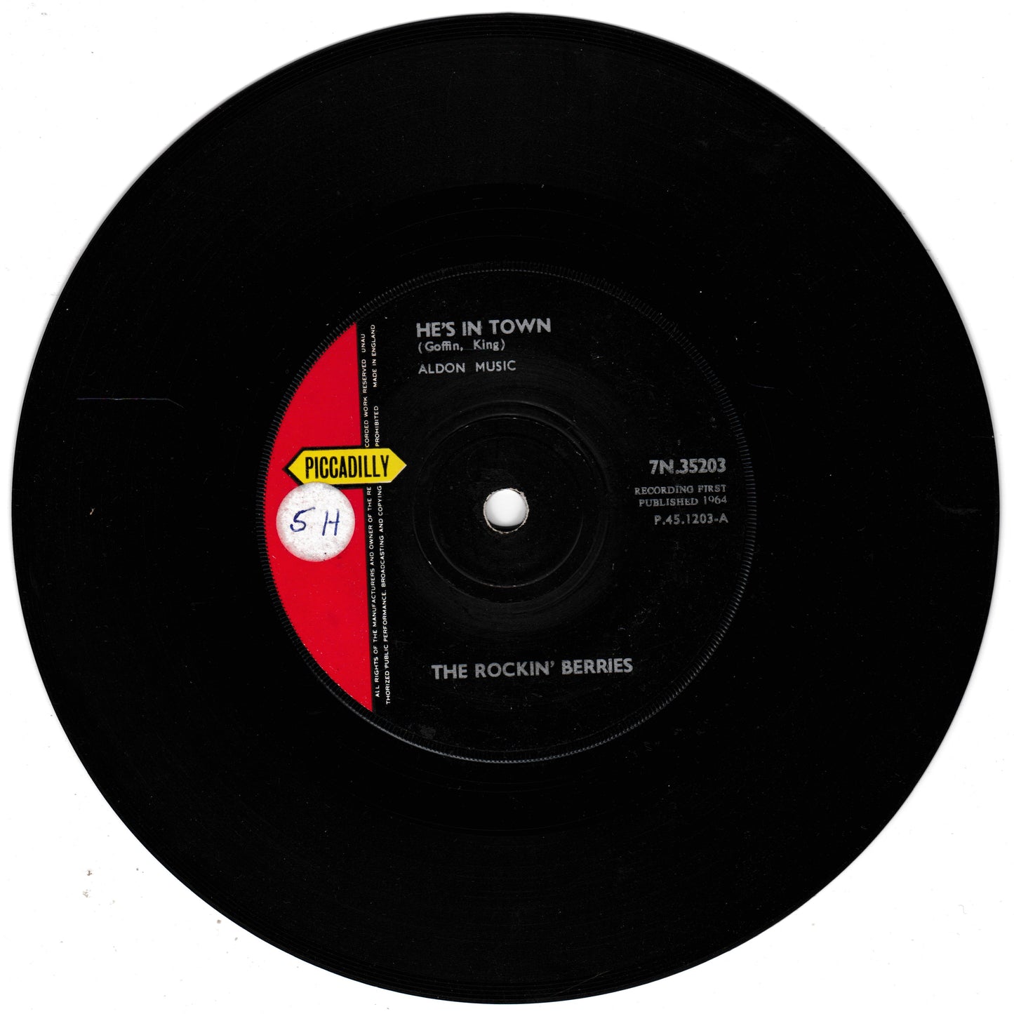 Vinyl record with label showing 'Piccadilly' and 'The Rockin' Berries' on a white background