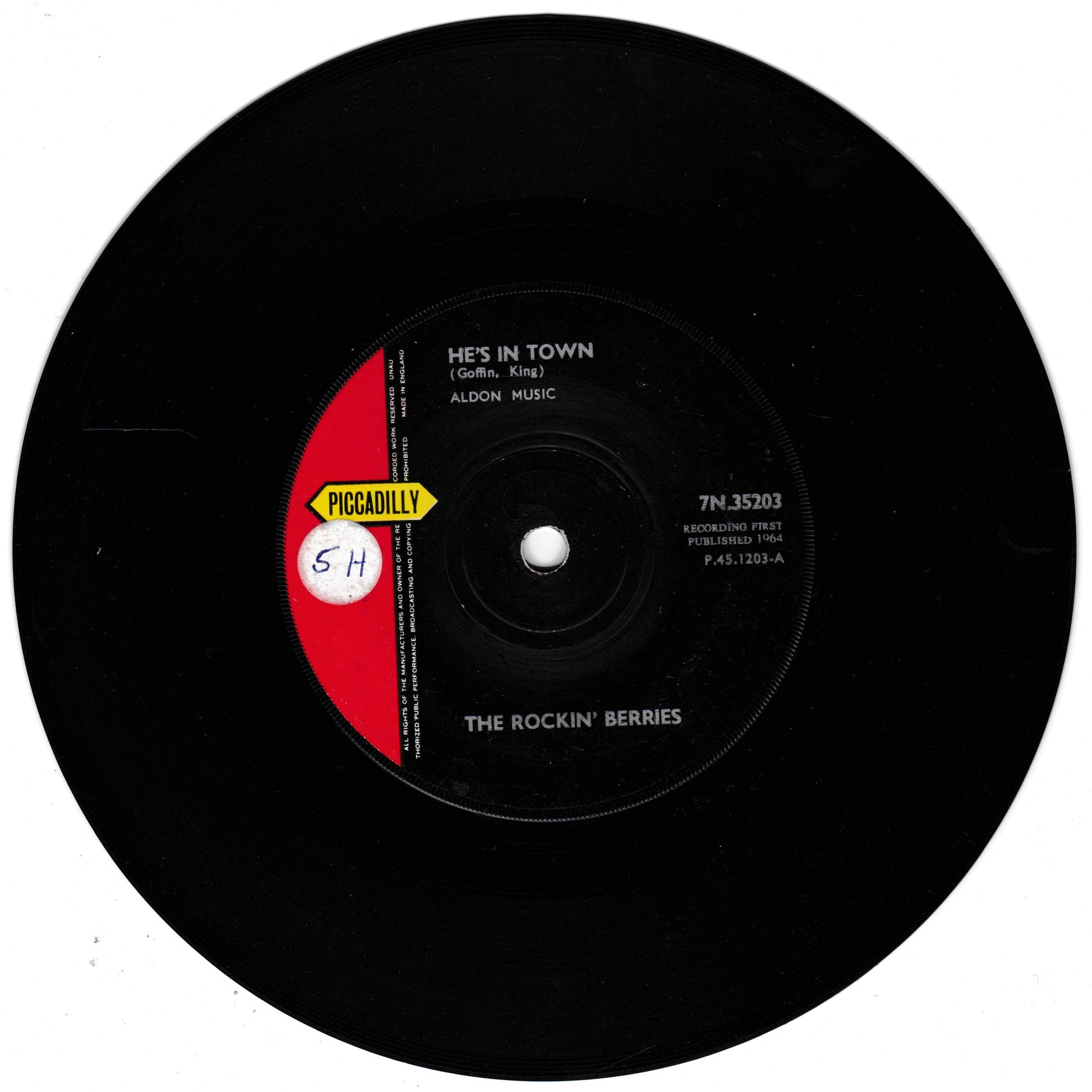 Vinyl record with label showing 'Piccadilly' and 'The Rockin' Berries' on a white background