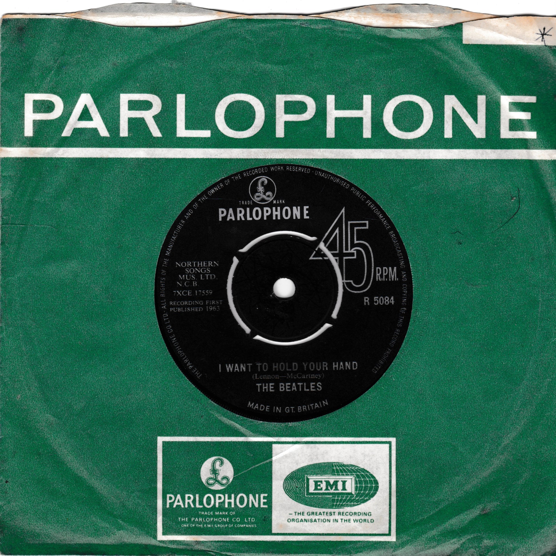 Vintage green Parlophone 45 RPM vinyl record sleeve for The Beatles' 'I Want to Hold Your Hand', with the black centre label visible and a Parlophone/EMI logo at the bottom.