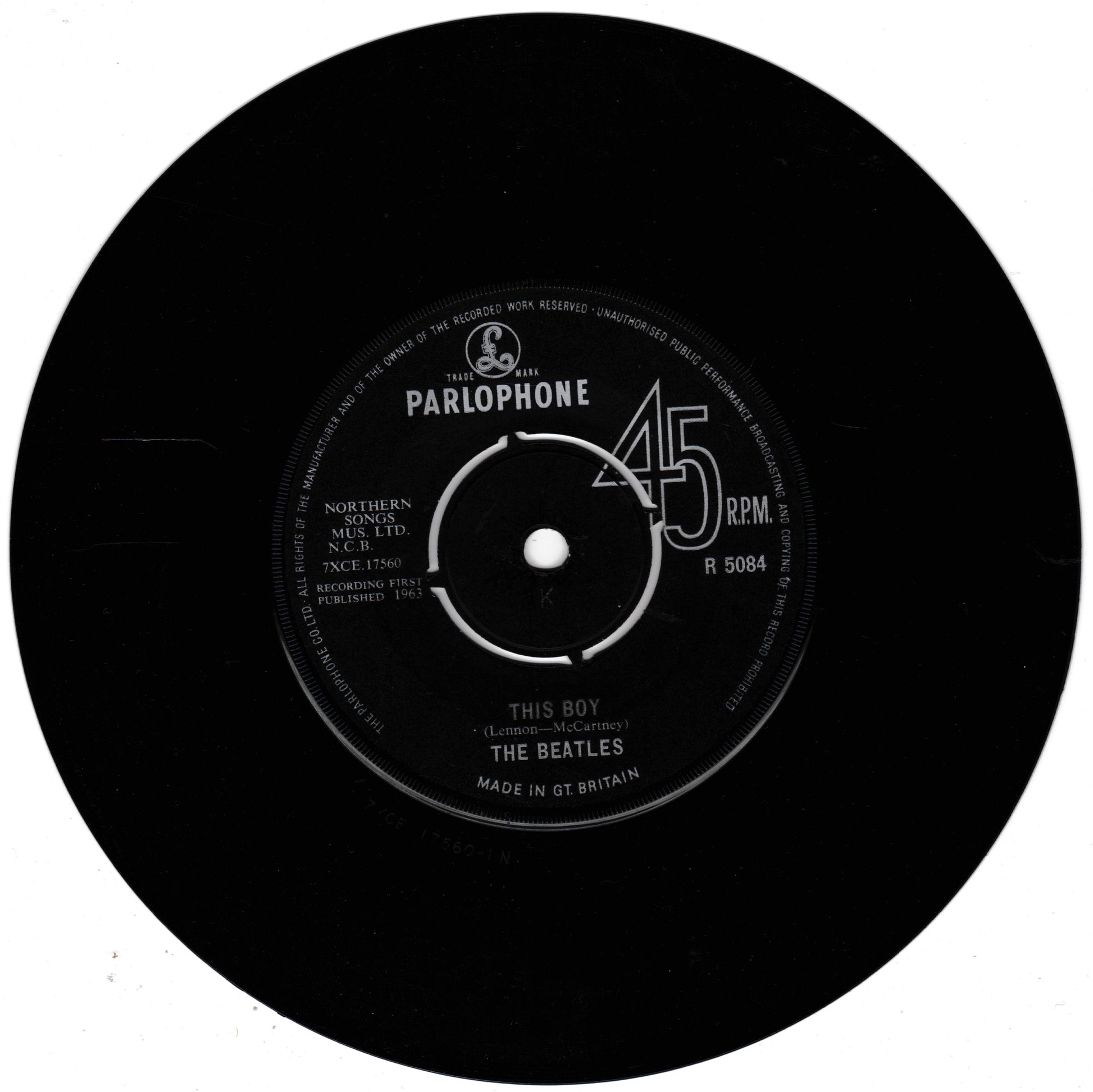 A black vinyl record with a white Parlophone label reading 'This Boy' by The Beatles, 45 RPM, on a plain white background.