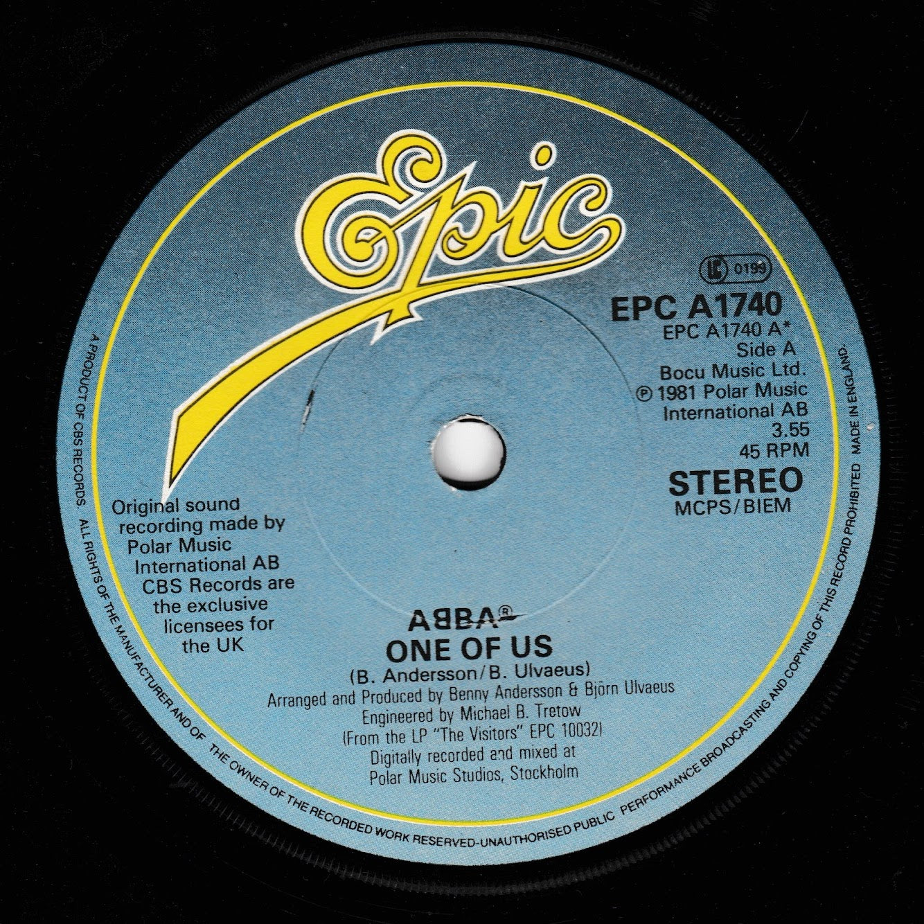 A close-up of a vinyl record label for ABBA's 'One of Us', featuring the yellow Epic logo and track details on a black record surface.
