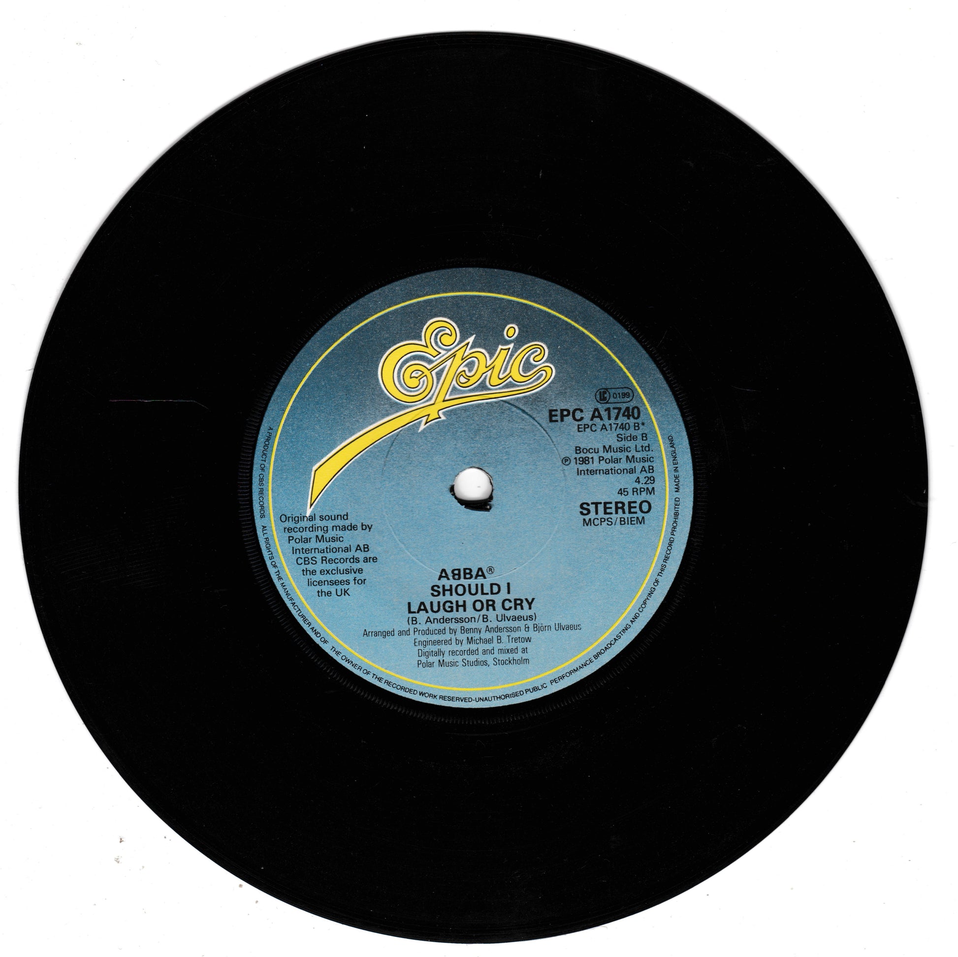 A black vinyl record with a blue and yellow centre label. The label features the yellow 'Epic' logo and text for ABBA's 'Should I Laugh or Cry'.
