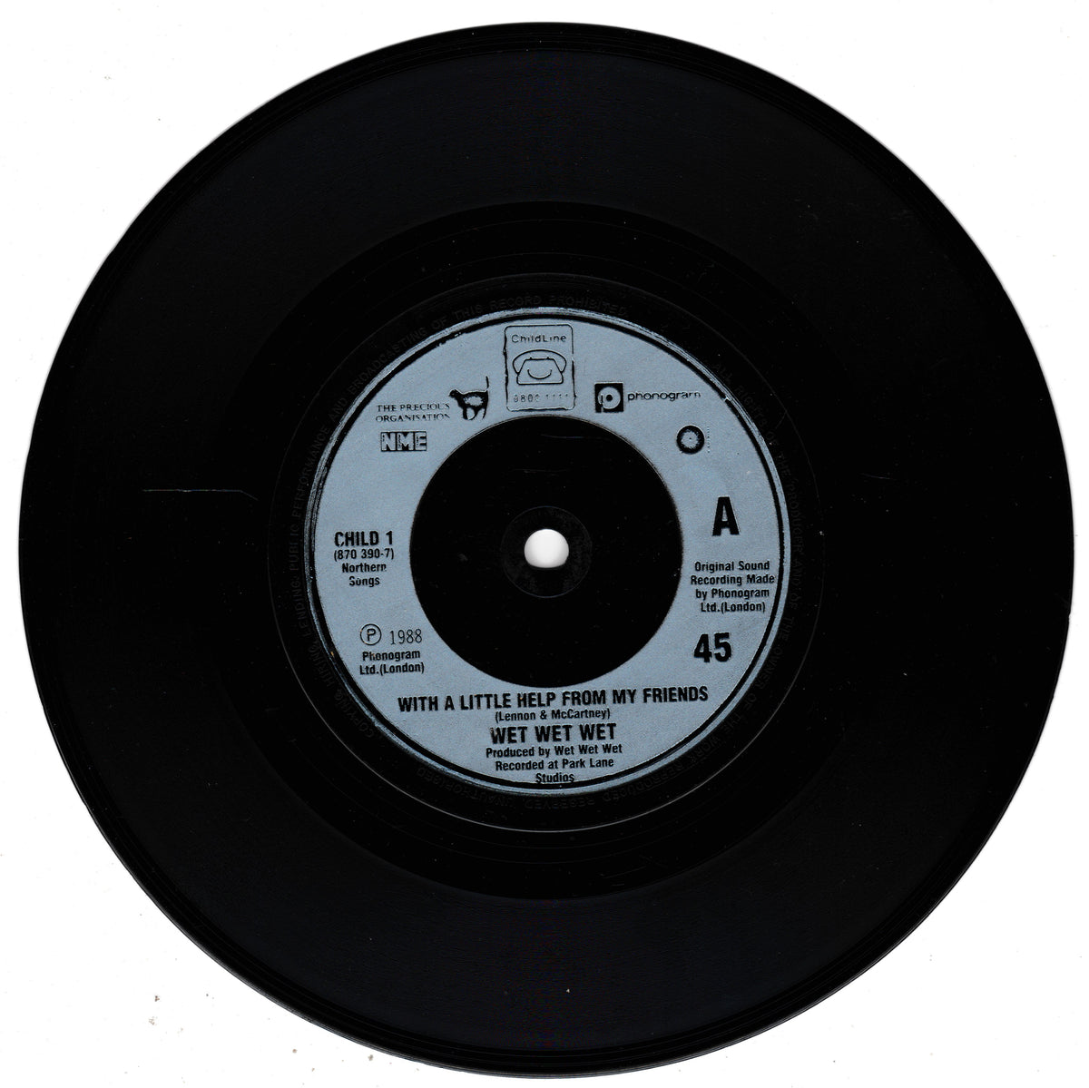 A black vinyl record with a silver centre label, featuring the song 'With a Little Help From My Friends' by Wet Wet Wet.