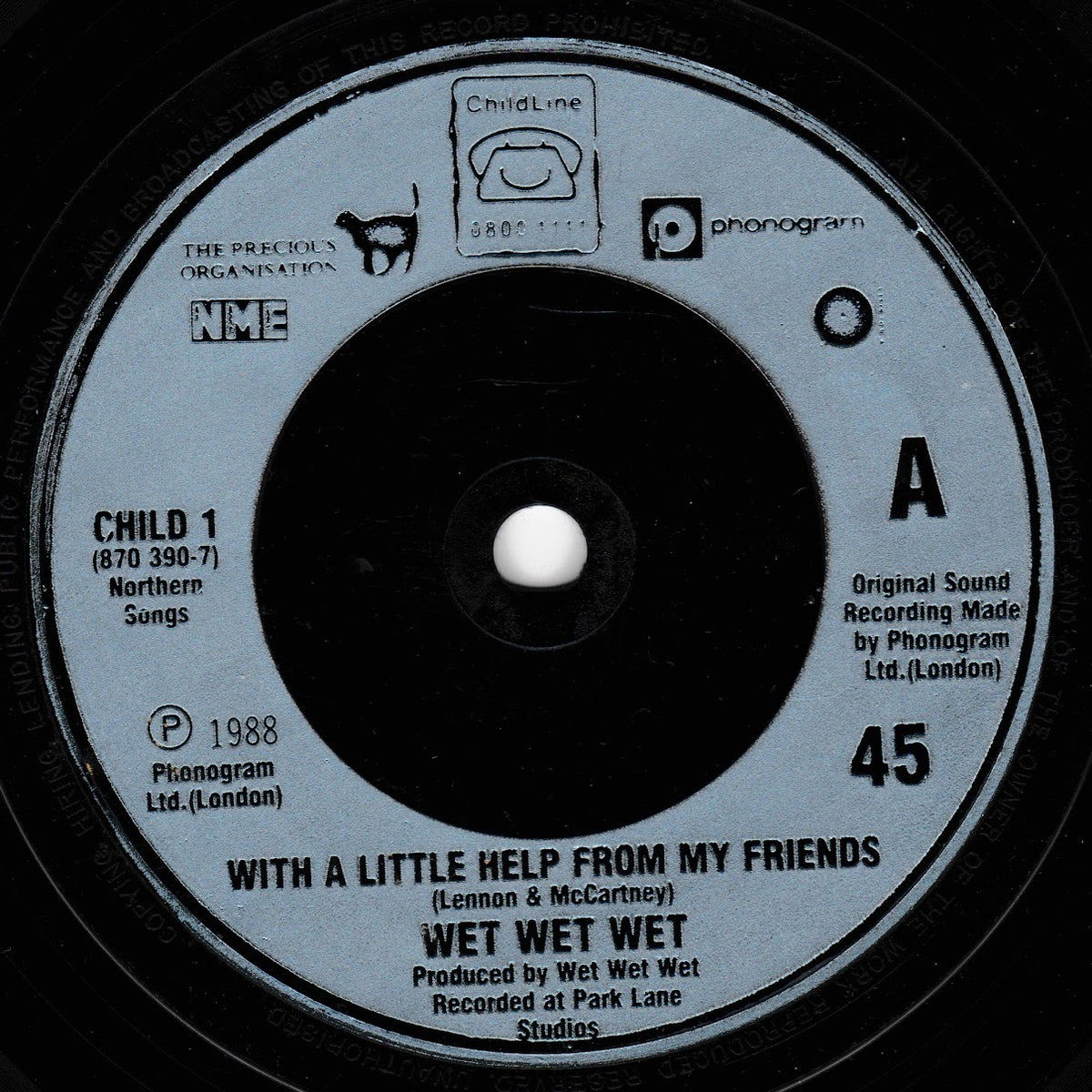 A close-up of a vinyl record label for Wet Wet Wet's 'With A Little Help From My Friends', showing the A-side track with Child Line and Phonogram branding.