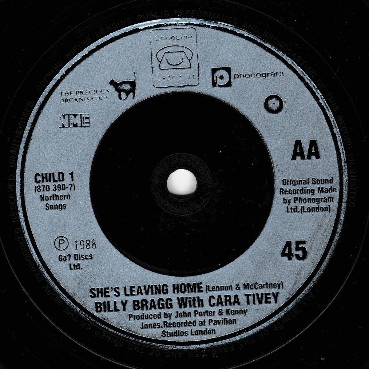 A close-up of a vinyl record label for 'She's Leaving Home' by Billy Bragg with Cara Tivey, featuring the Phonogram and NME logos on a black record.