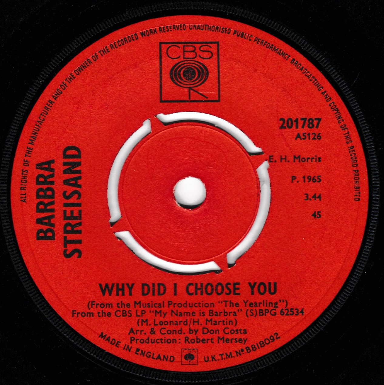 A close-up of a red vinyl record label for CBS Records, featuring the artist names Barbra Streisand and the song title 'Why Did I Choose You'.