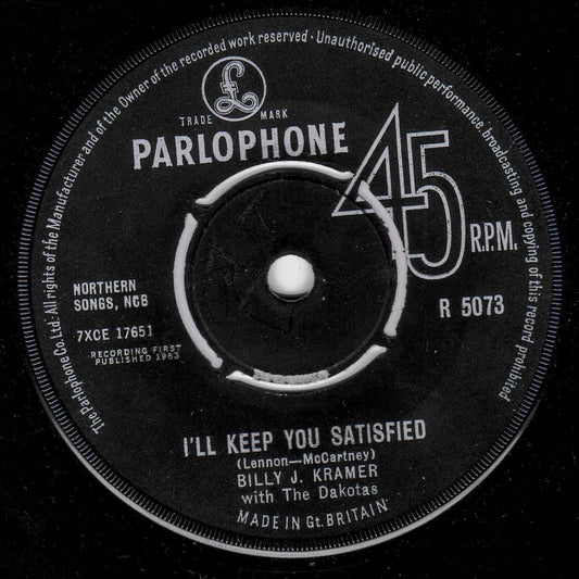 A black vinyl record label for Parlophone, featuring white printed text and graphics. The label reads 'Parlophone', '45 RPM', and 'I'll Keep You Satisfied' by Billy J. Kramer.
