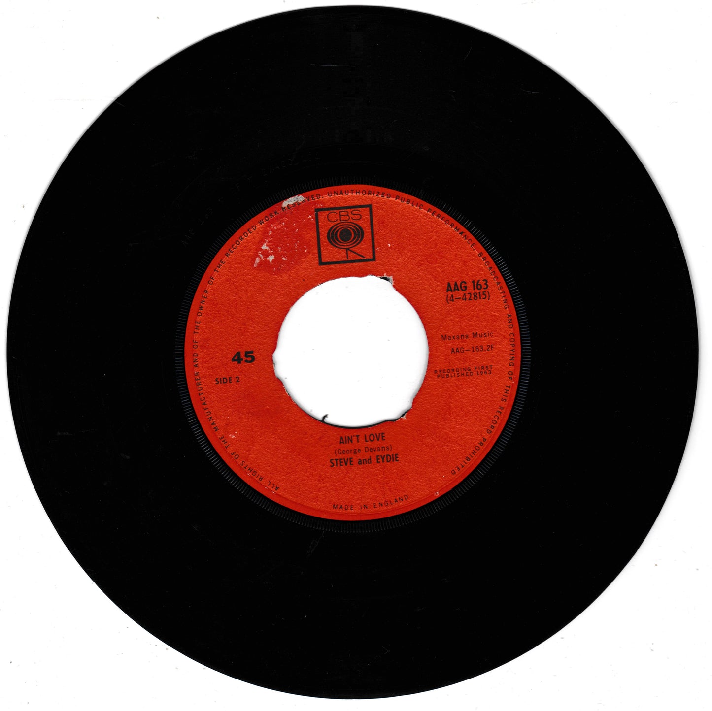A vintage 45 RPM vinyl record with a black outer disc and a bright red-orange centre label. The label features black printed text including the song title 'Don't Care' and artist 'Steve and Eydie', along with a small square logo near the top.