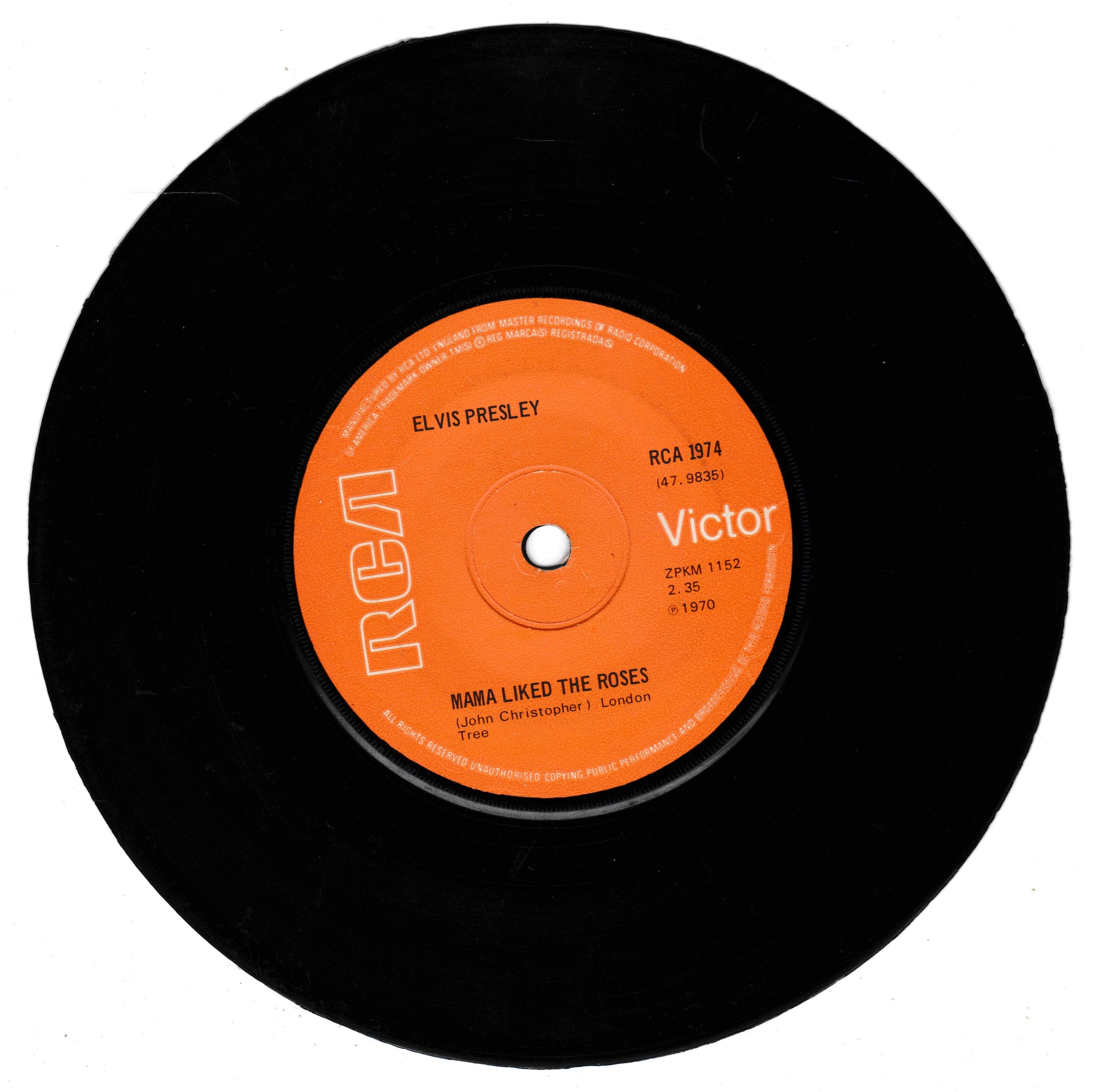A vintage 7-inch vinyl record by Elvis Presley, featuring an orange RCA Victor label with the song title 'Nana Liked the Roses' and cataloge number RCA 1874.