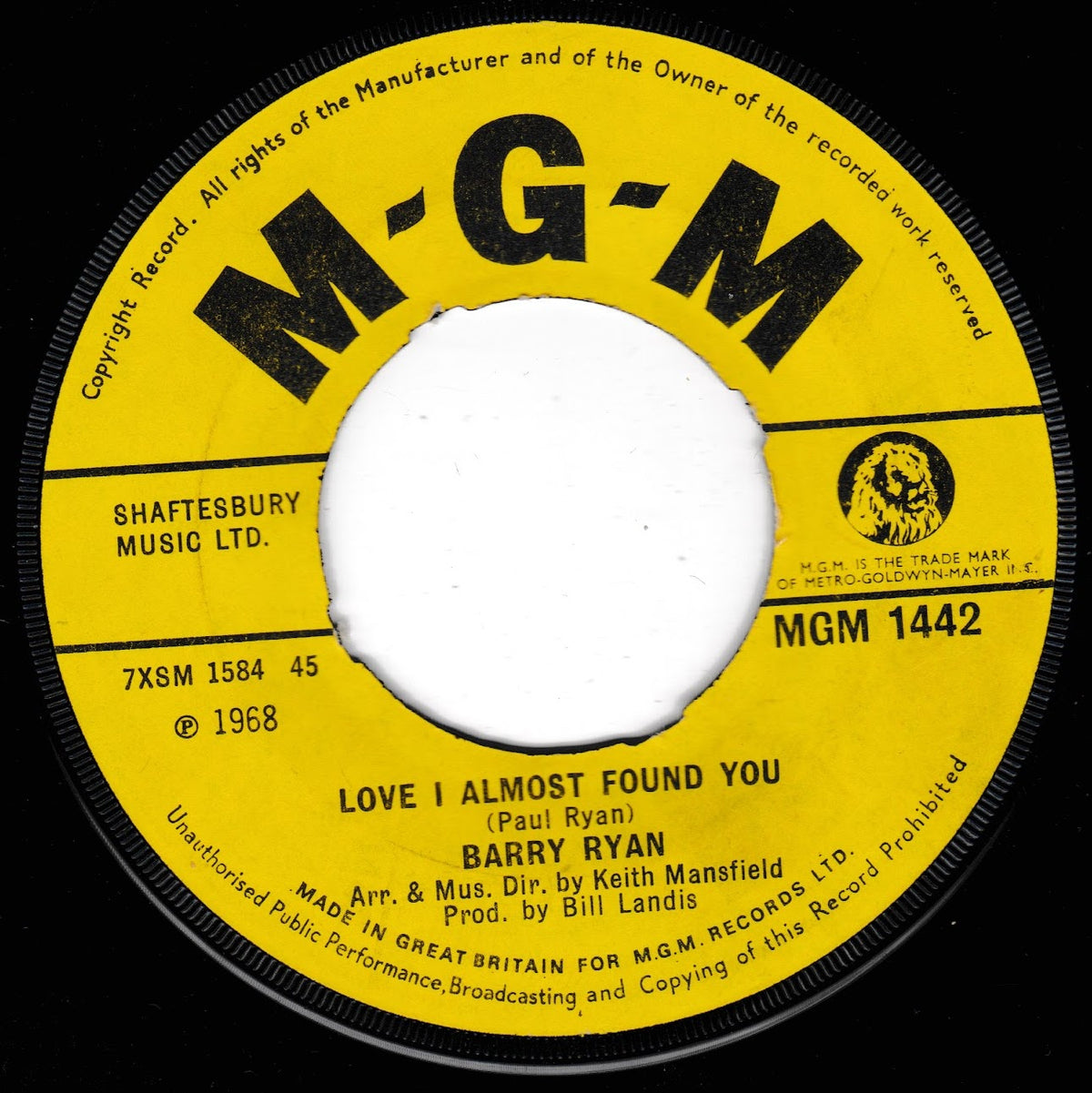 A vintage MGM 7-inch vinyl record label for 'Love I Almost Found You' by Barry Ryan, featuring a bright yellow label with black text and a white centre hole.