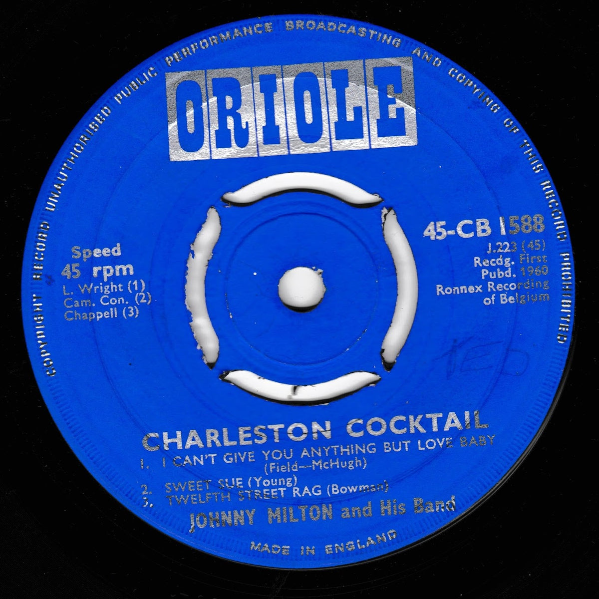 A blue Oriole 45 rpm vinyl record label for 'Charleston Cocktail' by Johnny Milton and His Band, featuring white text and a white centre hub on a black background.