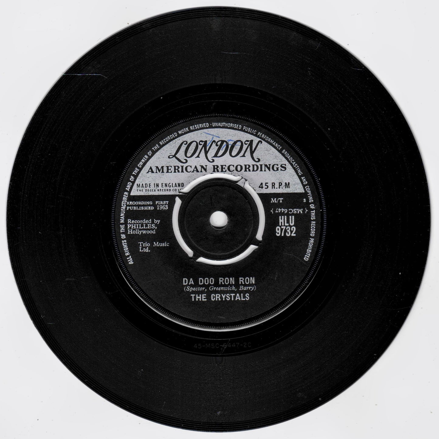 A black 45 RPM vinyl record label from London American Recordings, featuring the song 'Da Doo Ron Ron' by The Crystals, shown against a plain white background.