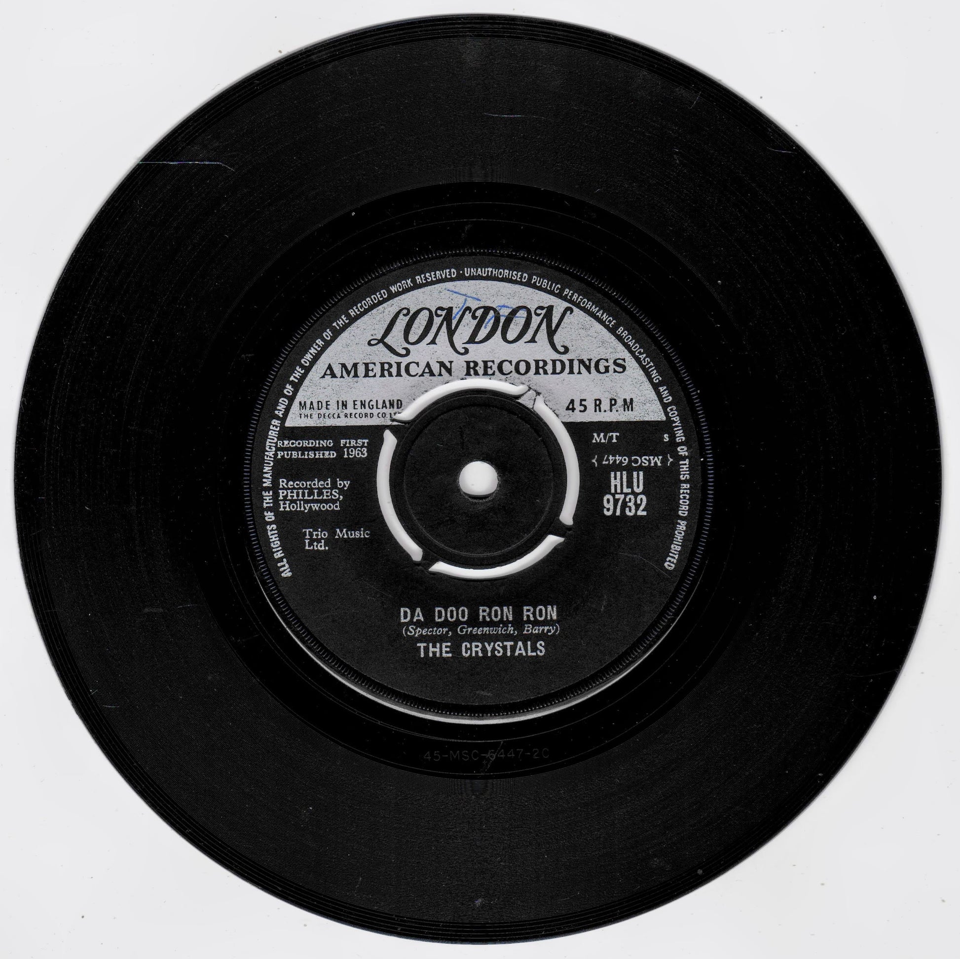 A black 45 RPM vinyl record label from London American Recordings, featuring the song 'Da Doo Ron Ron' by The Crystals, shown against a plain white background.