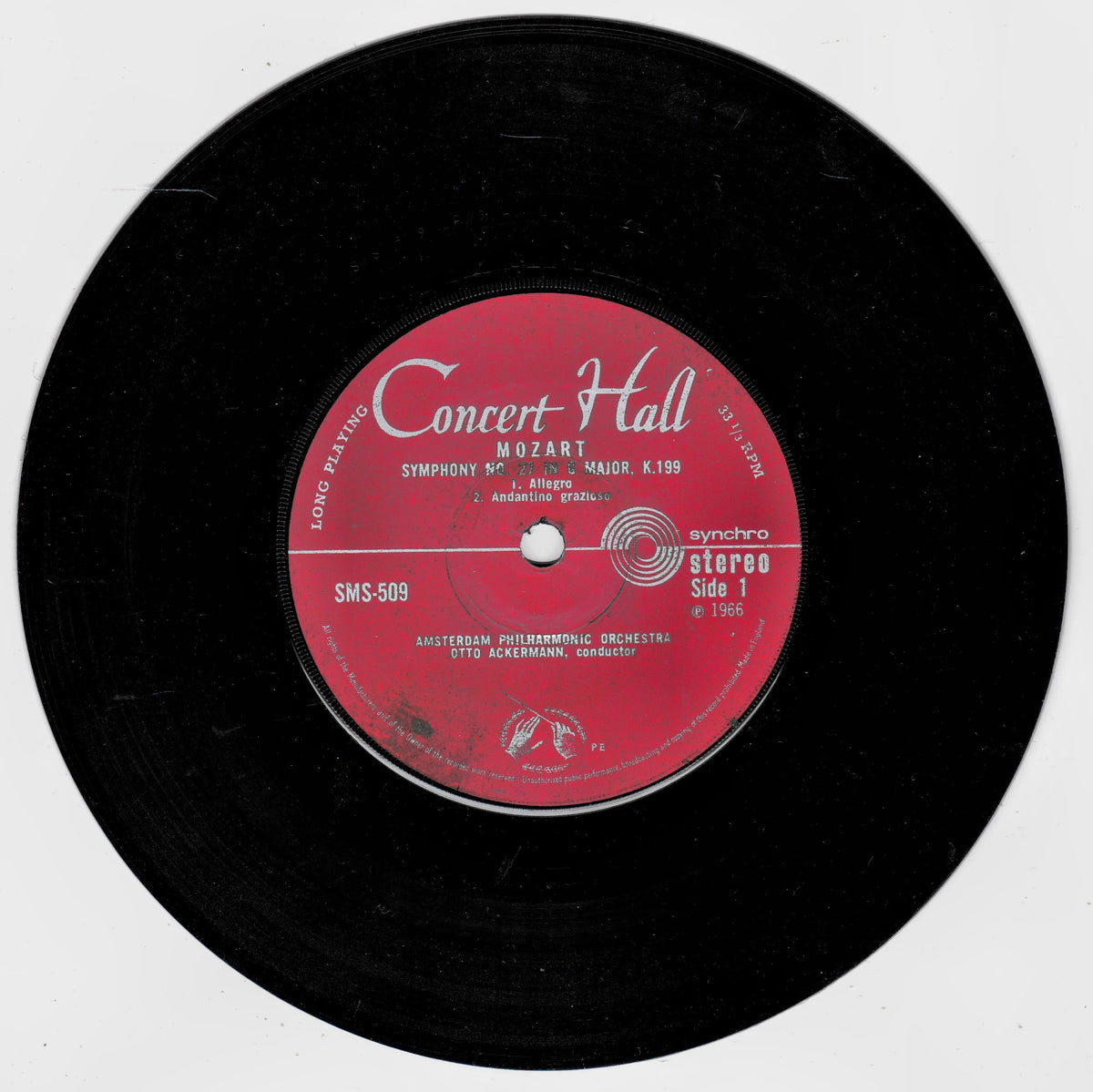 A black vinyl record with a red centre label reading 'Concert Hall' and 'Mozart Symphony No. 9 in D minor K.