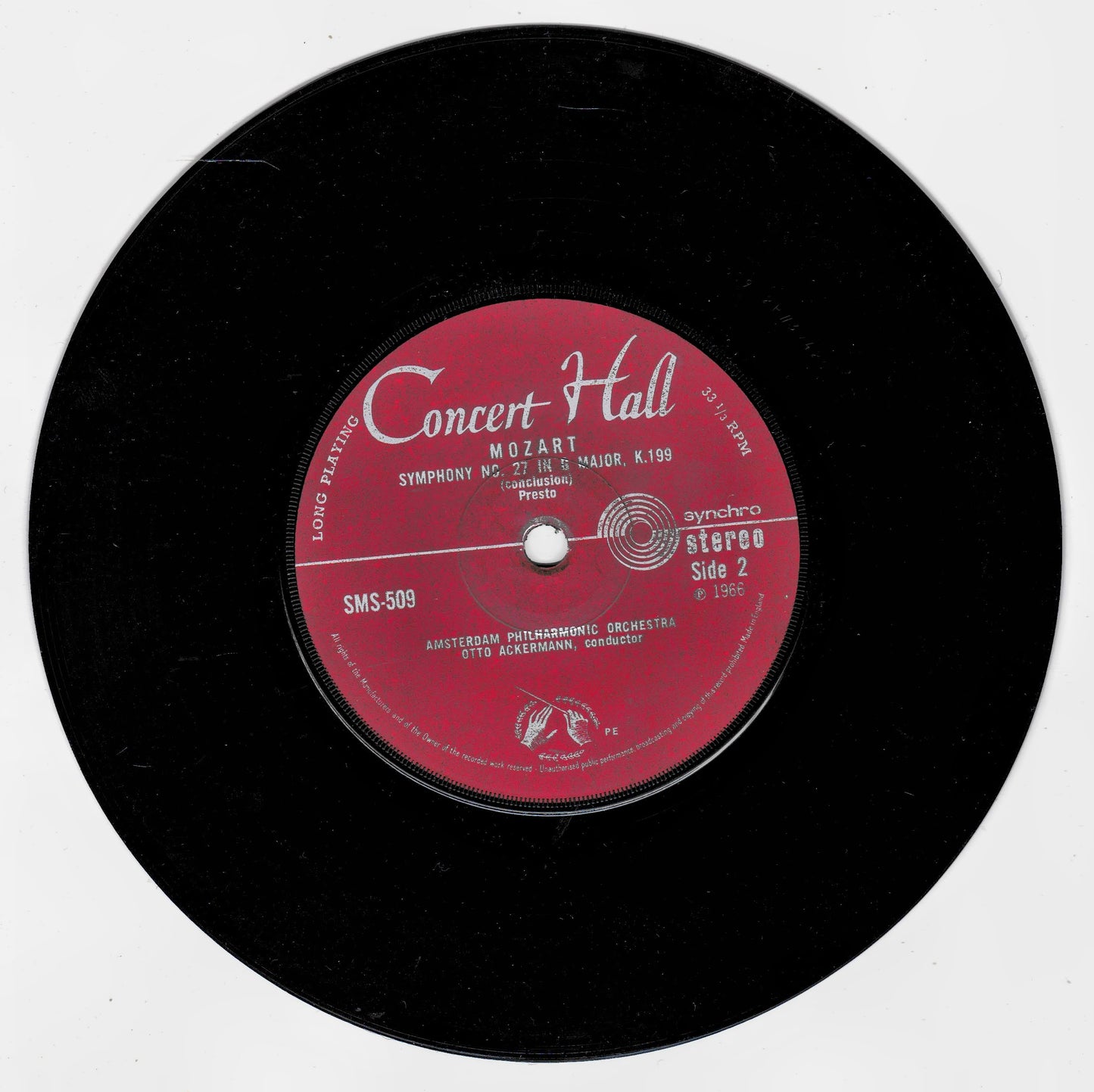 A black vinyl record with a red centre label reading 'Concert Hall' and 'Mozart Symphony No. 95 Side 2', photographed on a plain white background.