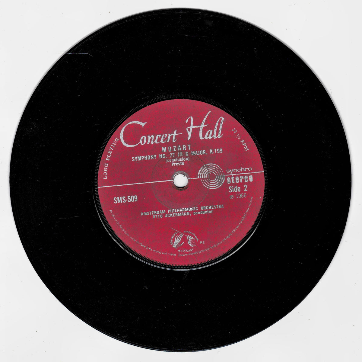 A black vinyl record with a red centre label reading 'Concert Hall' and 'Mozart Symphony No. 95 Side 2', photographed on a plain white background.