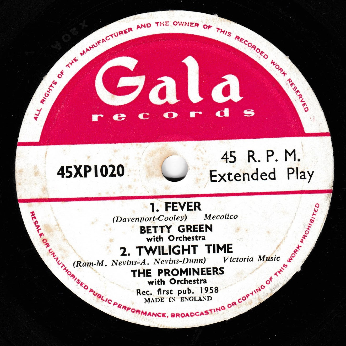 A vintage 1958 45rpm record label for Gala Records, featuring the first two tracks from 'The Promineers with Orchestra' including 'Fever' and 'Twilight Time'. The label has a red and white design on a black vinyl background.